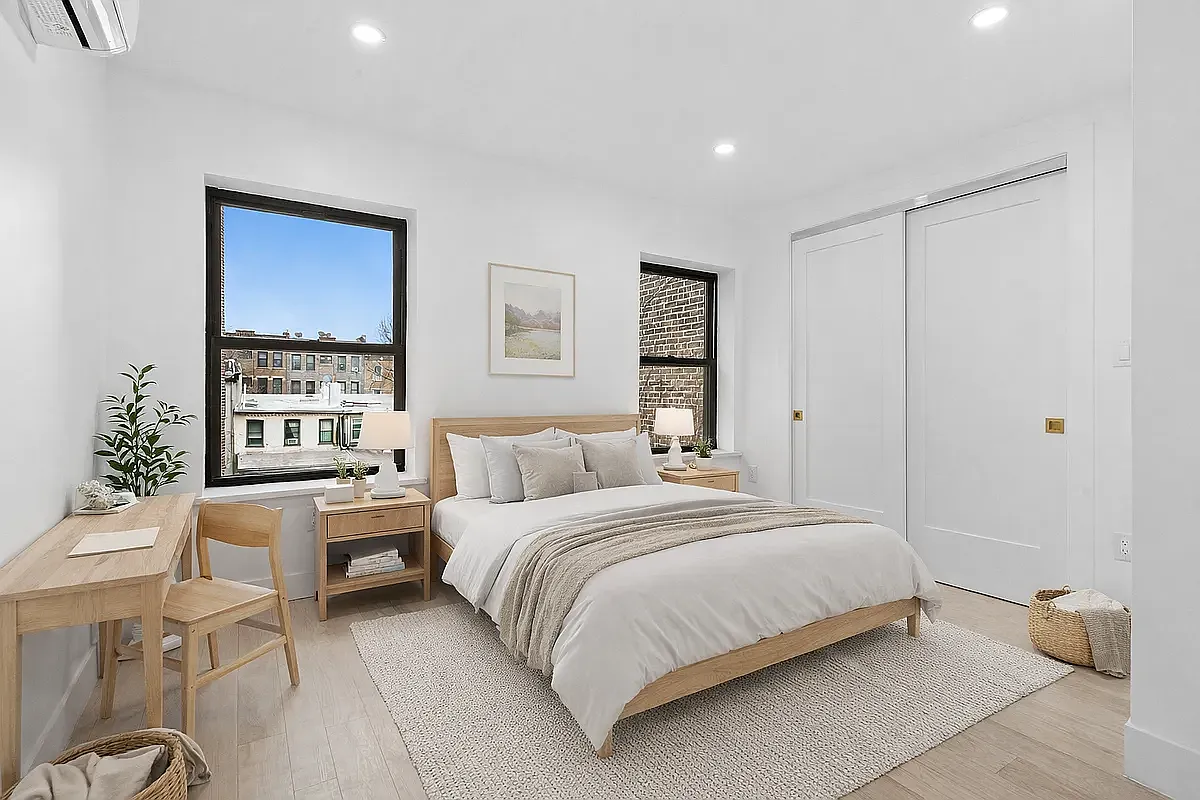 452 Dean Street, Unit 2F Brooklyn, NY 11217 - Photo 4 of 8 a bedroom with a bed window and couch