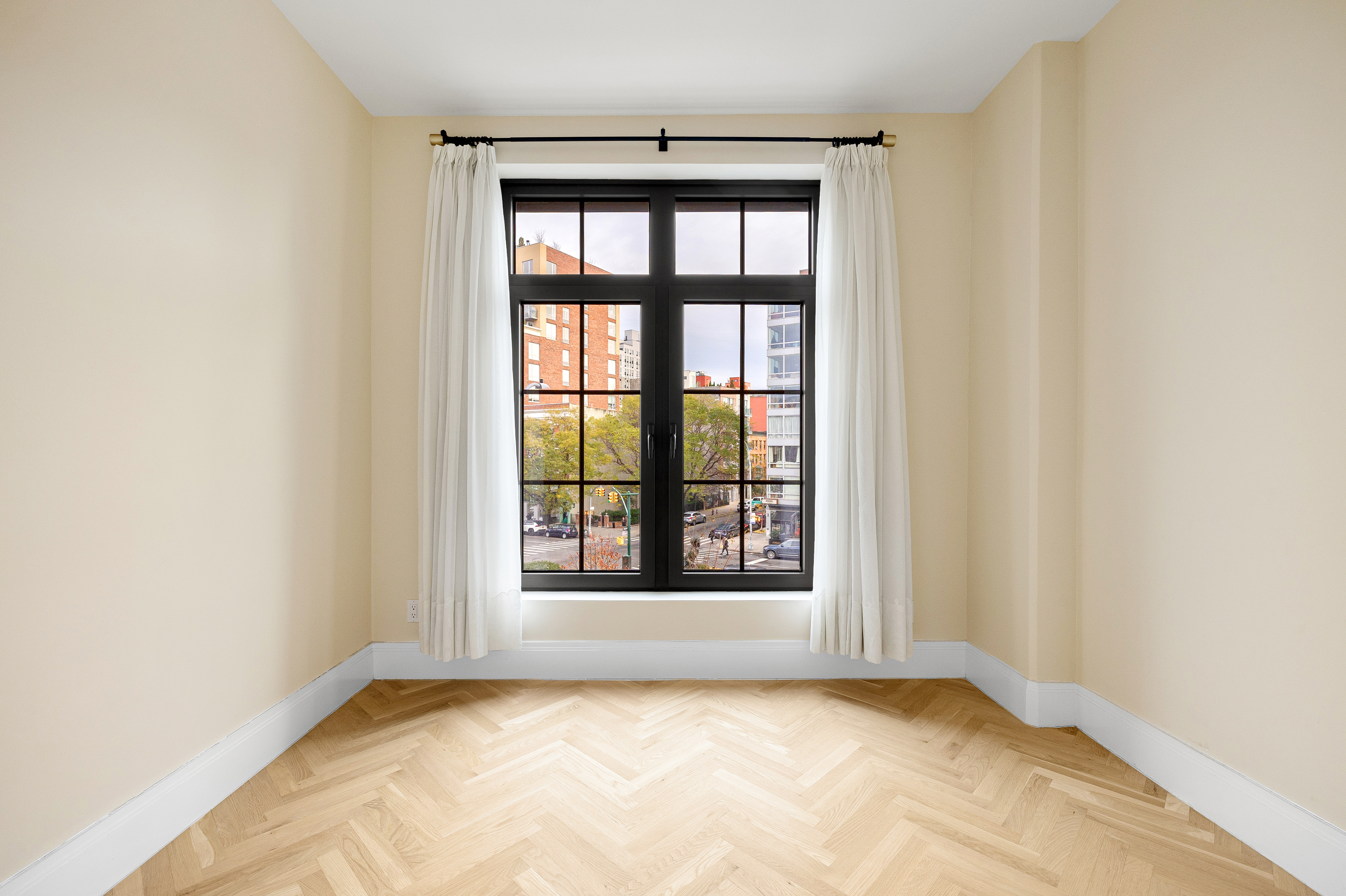 300 West 122nd Street, Unit 4F Manhattan, NY 10027 - Photo 11 of 32 a view of an empty room with a window