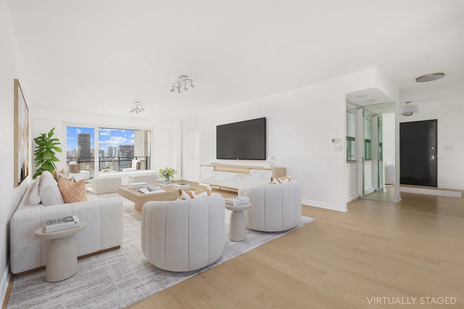 a living room with furniture and a flat screen tv