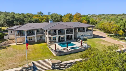 a kitchen with a stove and a cabinets
