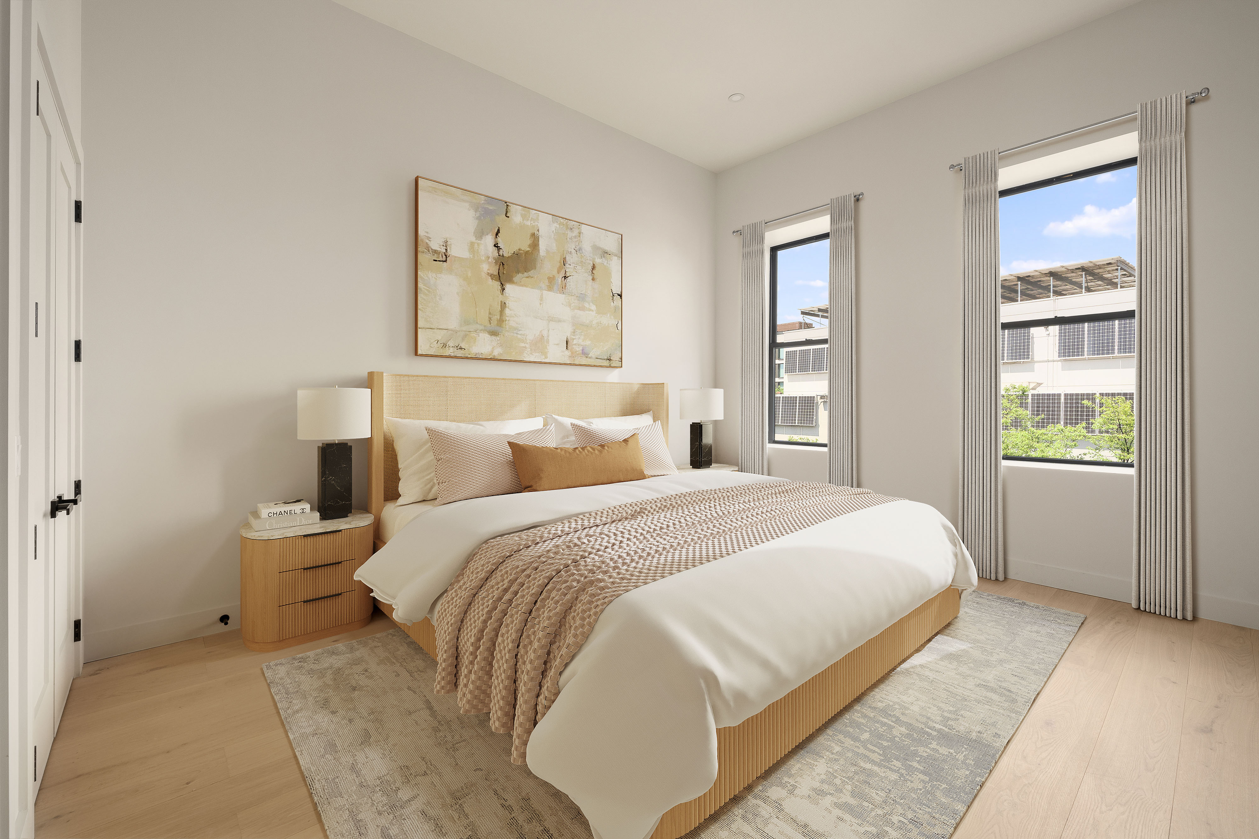 216 Grand Street, Unit LOFT 2 Brooklyn, NY 11211 - Photo 4 of 9 a bedroom with a large bed and a window