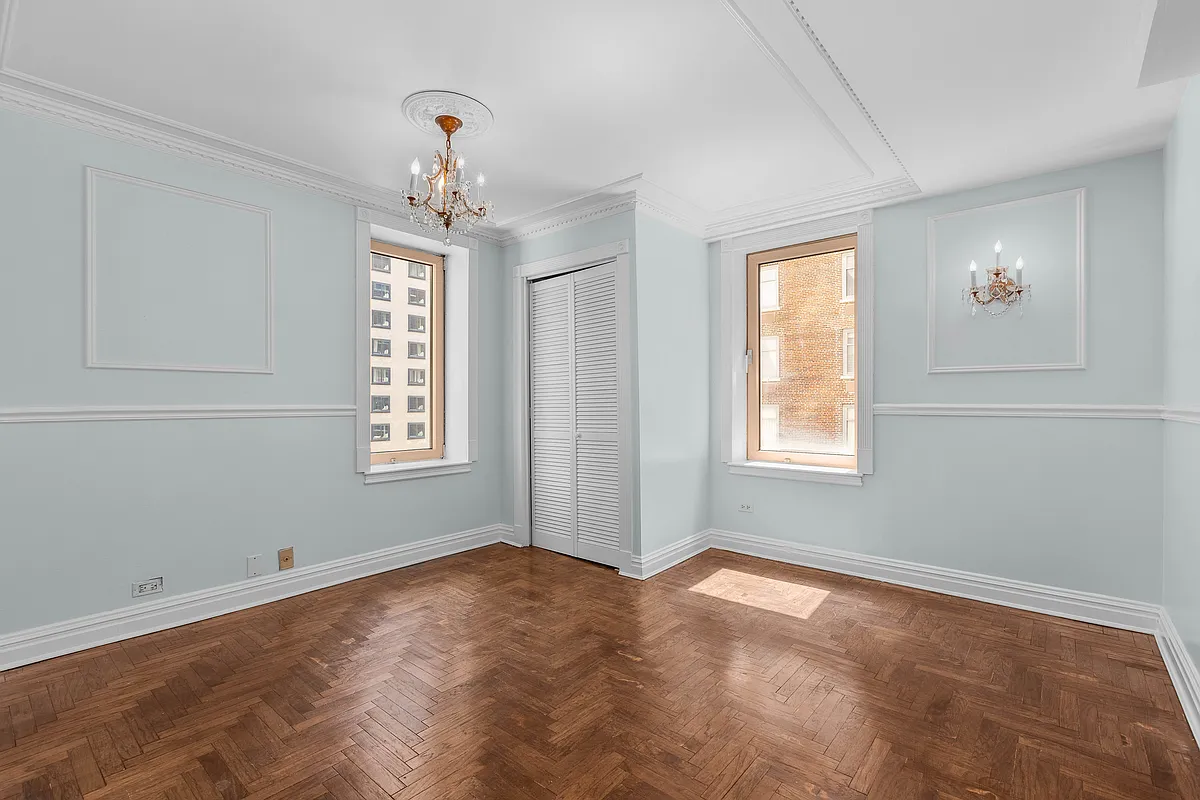 106 Central Park South, Unit 7L Manhattan, NY 10019 - Photo 4 of 10 a view of wooden floor and windows in a room