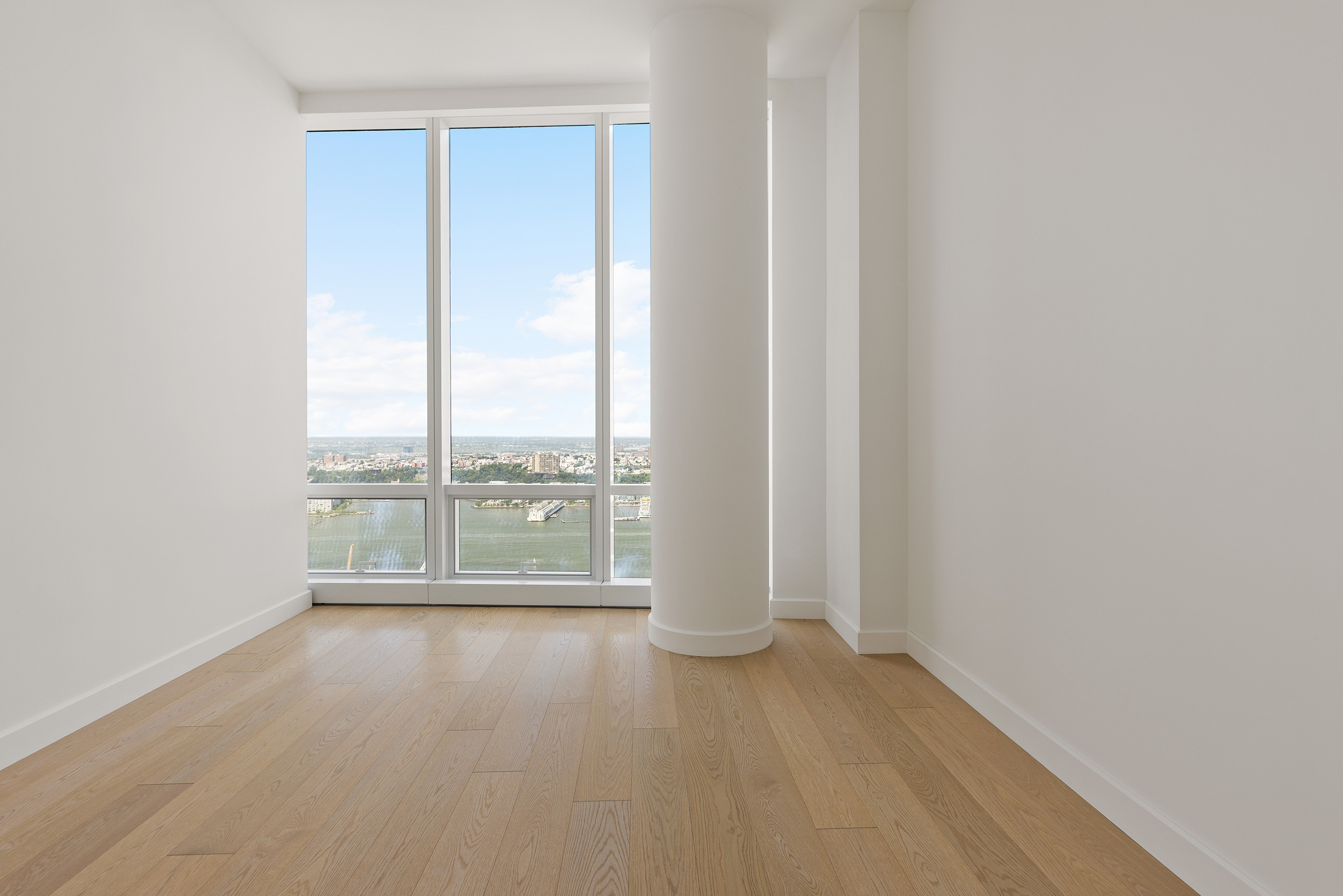 15 Hudson Yards, Unit 68C Manhattan, NY 10001 - Photo 13 of 16 a view of a room with window