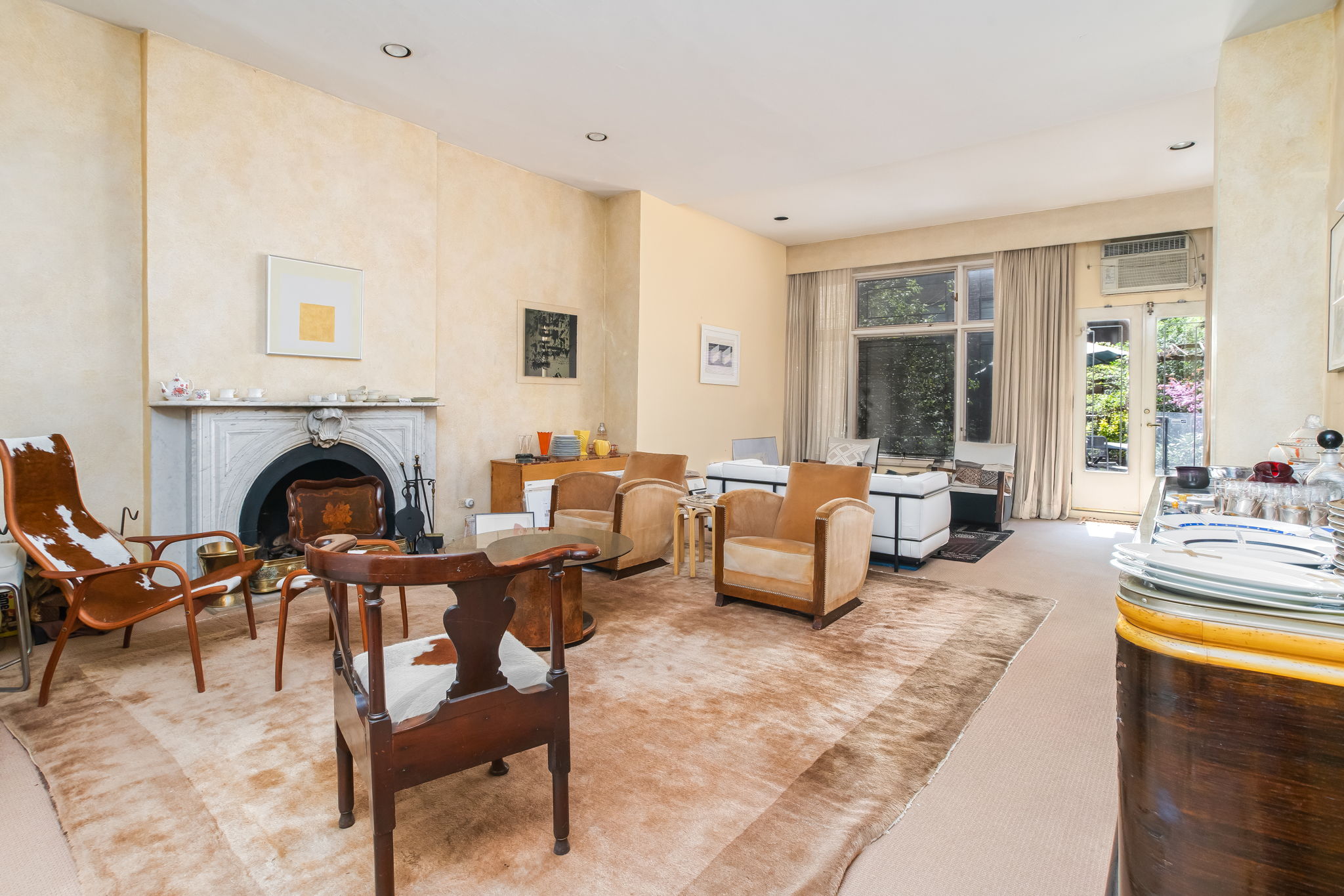 206 East 30th Street Manhattan, NY 10016 - Photo 6 of 21 a living room with fireplace furniture and a fireplace
