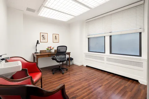 a workspace with wooden floor