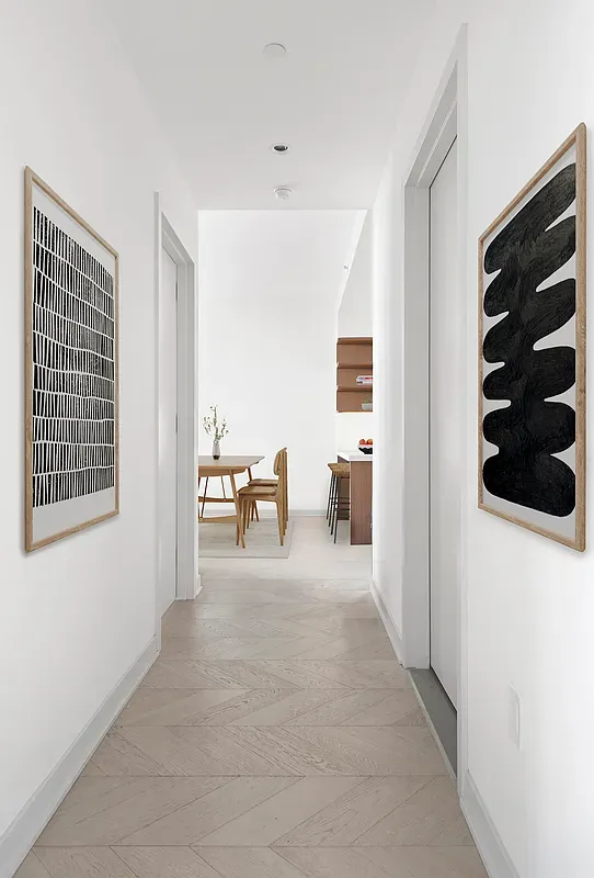 a view of a livingroom with a staircase and living room view