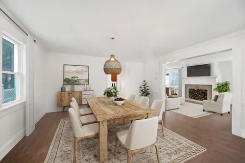 a view of a livingroom with furniture and a fireplace