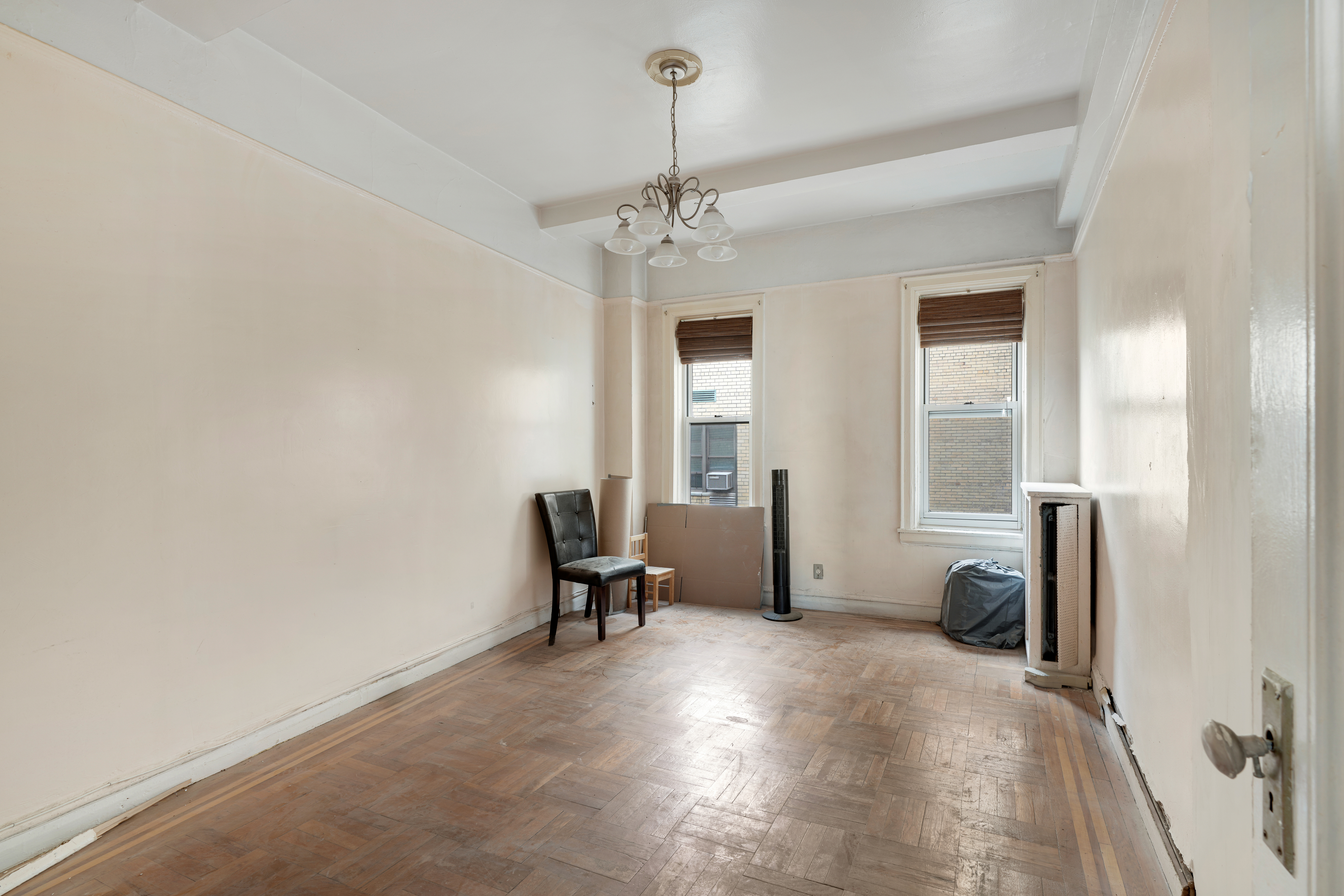 416 Ocean Avenue, Unit 62 Brooklyn, NY 11226 - Photo 11 of 22 a view of livingroom with furniture and windows