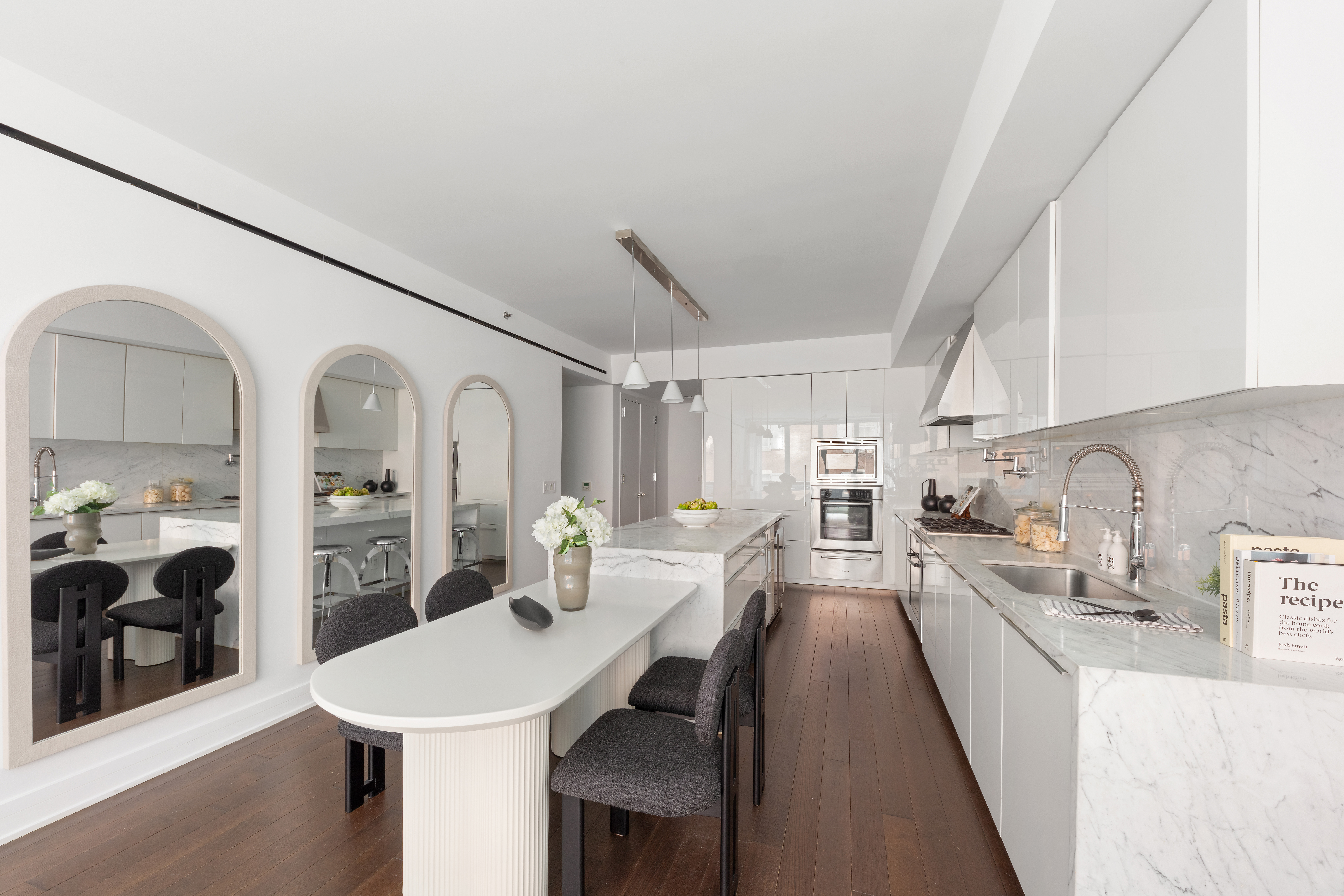 5 Franklin Place, Unit 3A Manhattan, NY 10013 - Photo 2 of 17 a view of a kitchen area with furniture and wooden floor