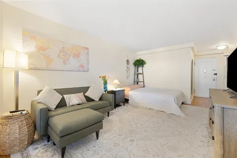 a view of a livingroom with wooden floor