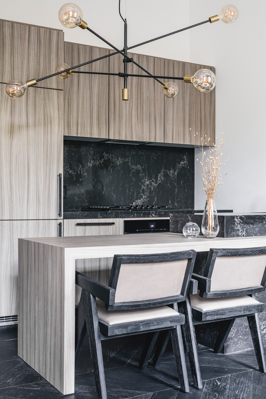 51 Morton Street, Unit 5D Manhattan, NY 10014 - Photo 6 of 17 a kitchen with a table chairs stove and cabinets