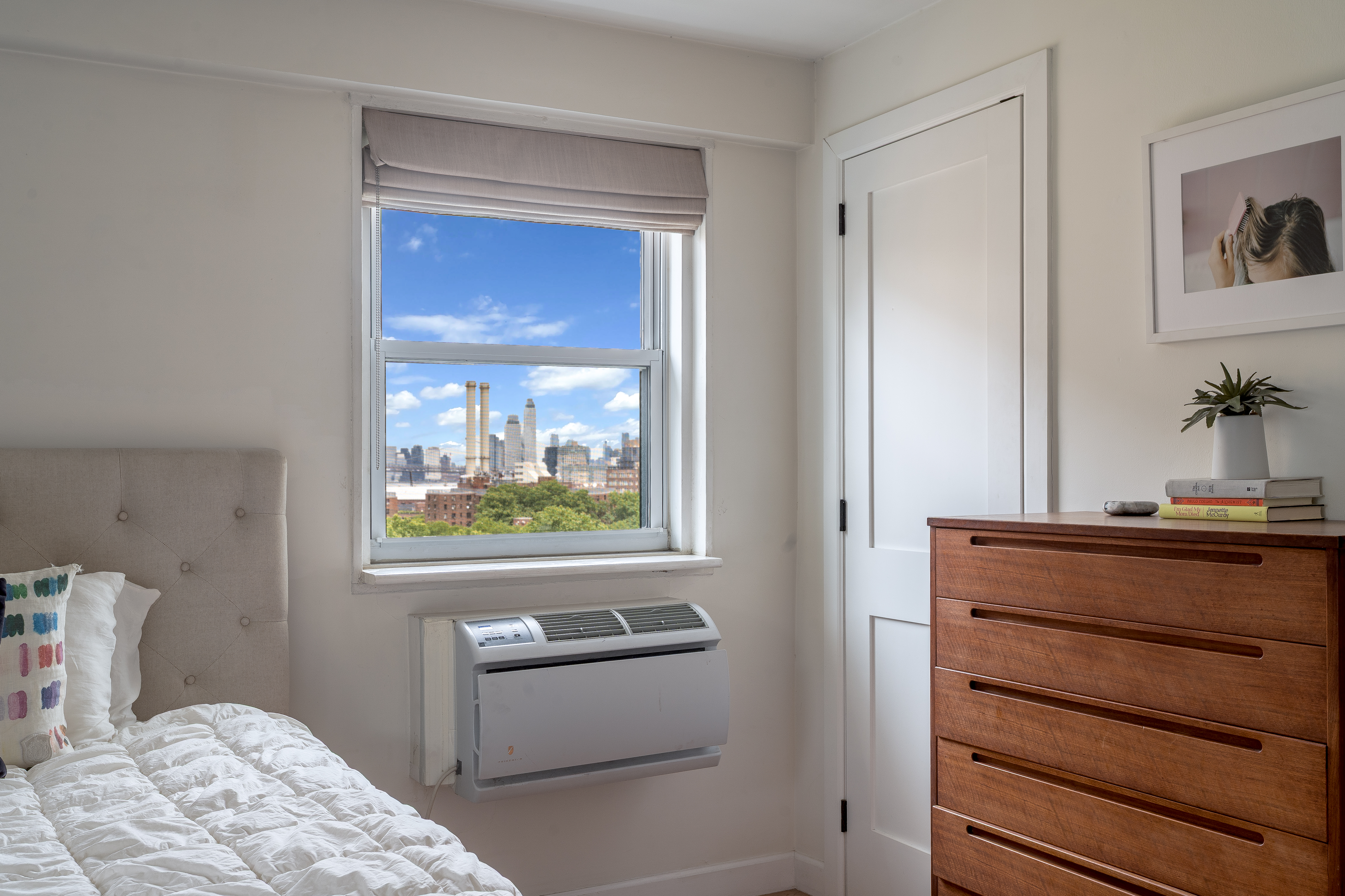 191 Willoughby Street, Unit 12J Brooklyn, NY 11201 - Photo 6 of 19 a bedroom with a bed and a window