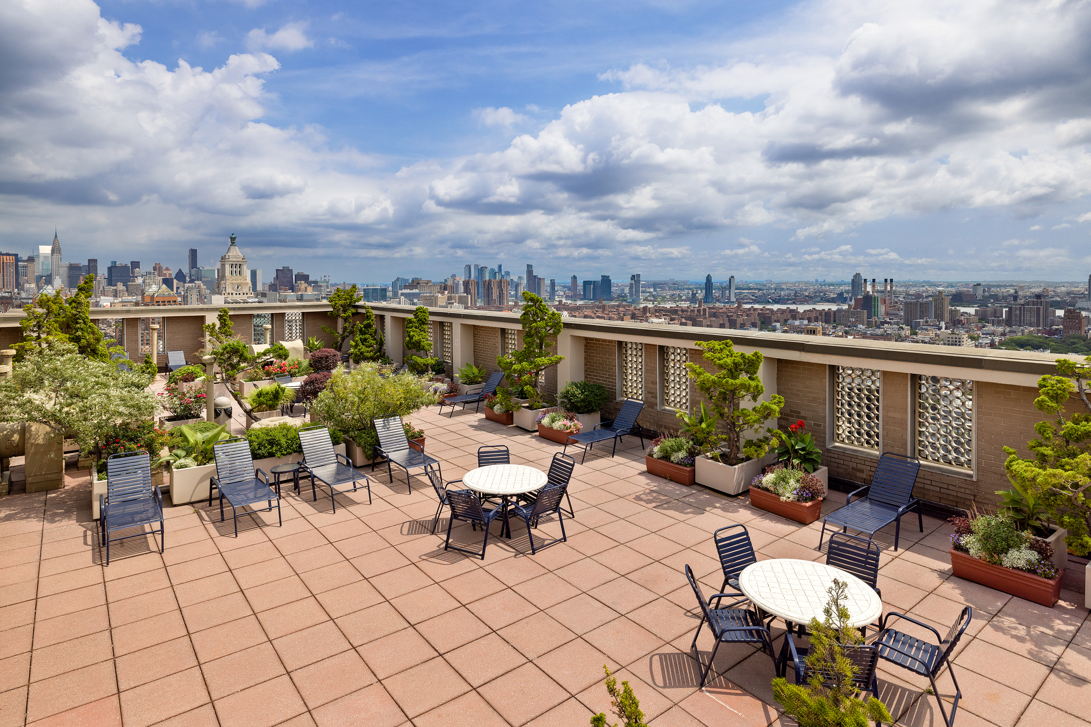 60 East 8th Street, Unit 15D Manhattan, NY 10003 - Photo 10 of 14 a view of a chairs and table in a patio