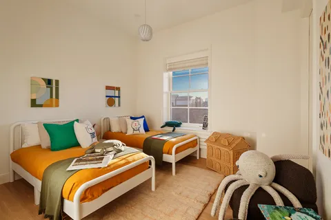 a bathroom with a sink and a window