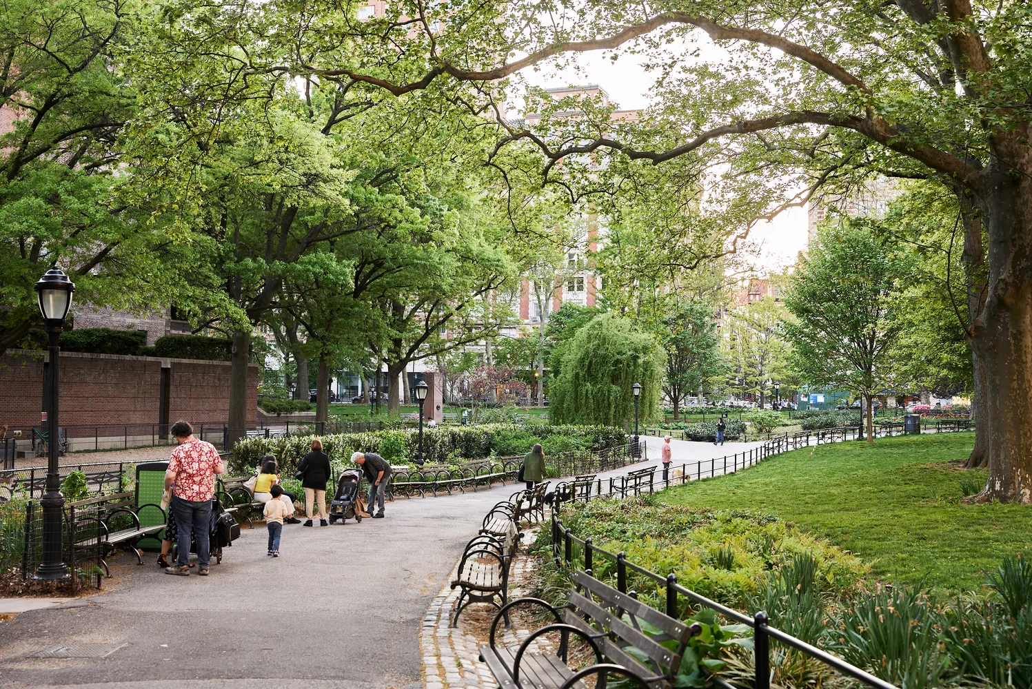 a view of a lake with tall buildings