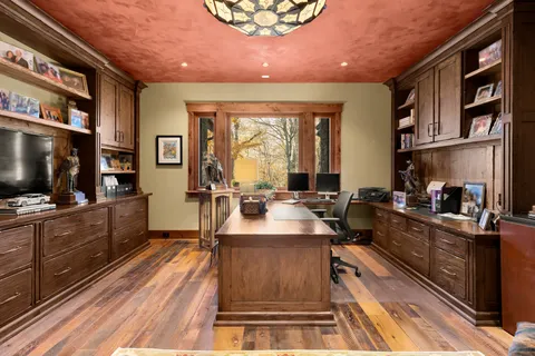 a kitchen with sink and cabinets