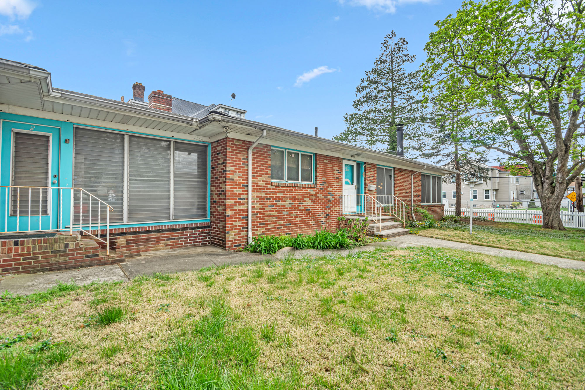 2 Livingston Court Staten Island, NY 10310 - Photo 2 of 14 a front view of a house with a yard