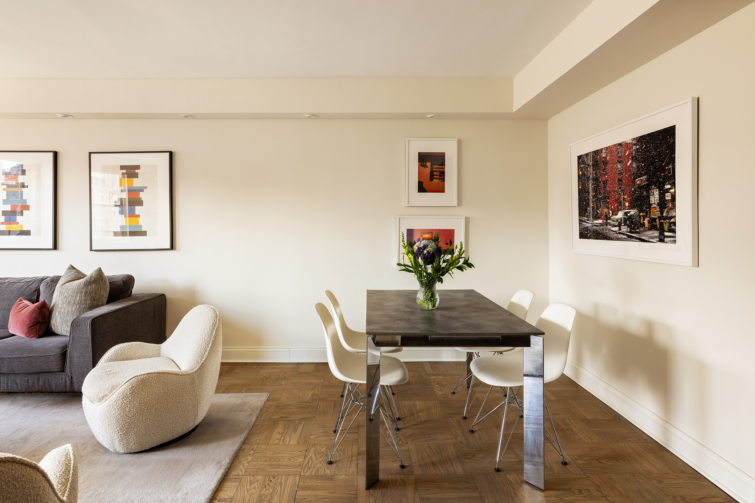 135 East 83rd Street, Unit 14B Manhattan, NY 10028 - Photo 3 of 16 a living room with furniture and a potted plant