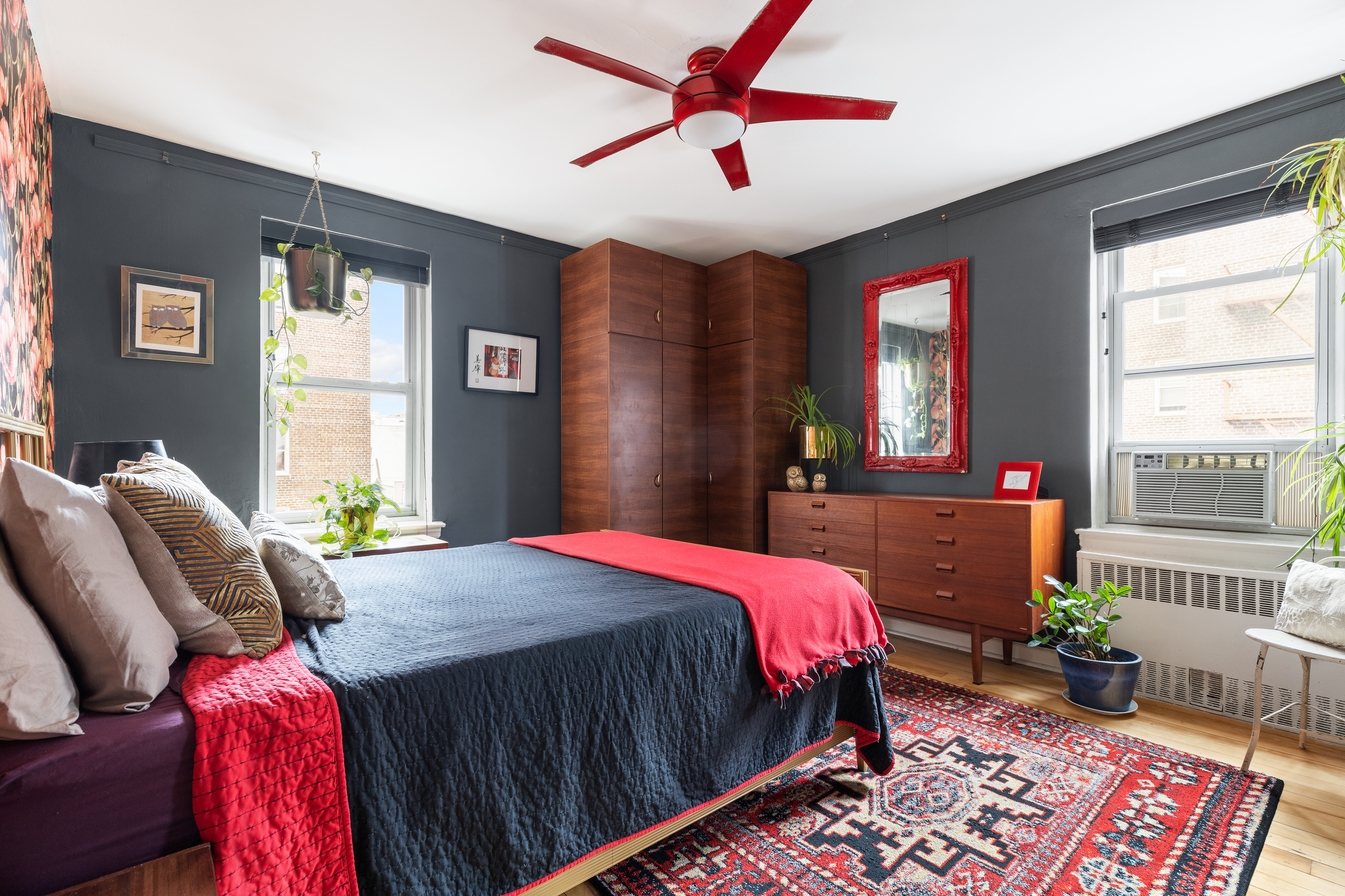 39-50 52nd Street, Unit 3E Queens, NY 11377 - Photo 2 of 7 a bedroom with a bed dresser and a window
