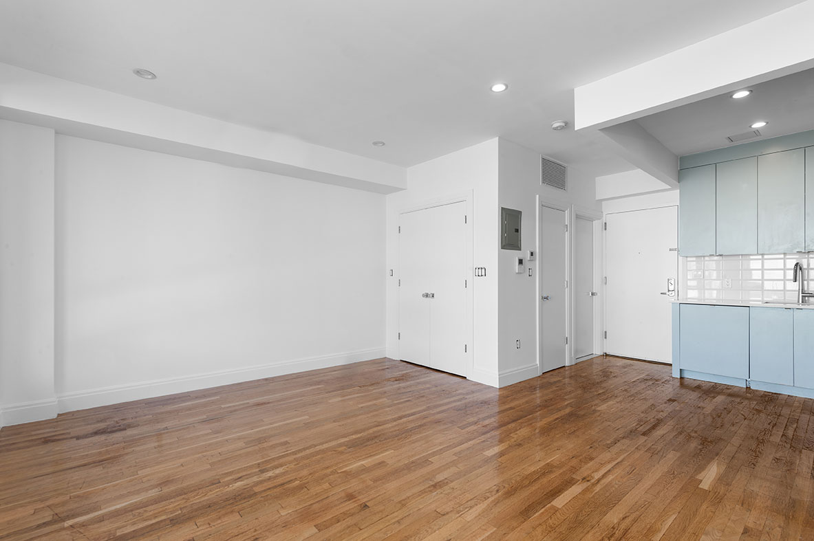686 MacDonough Street, Unit 2A Brooklyn, NY 11233 - Photo 5 of 8 a view of kitchen with wooden floor