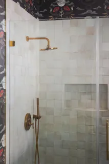 a close view of a shower in bathroom