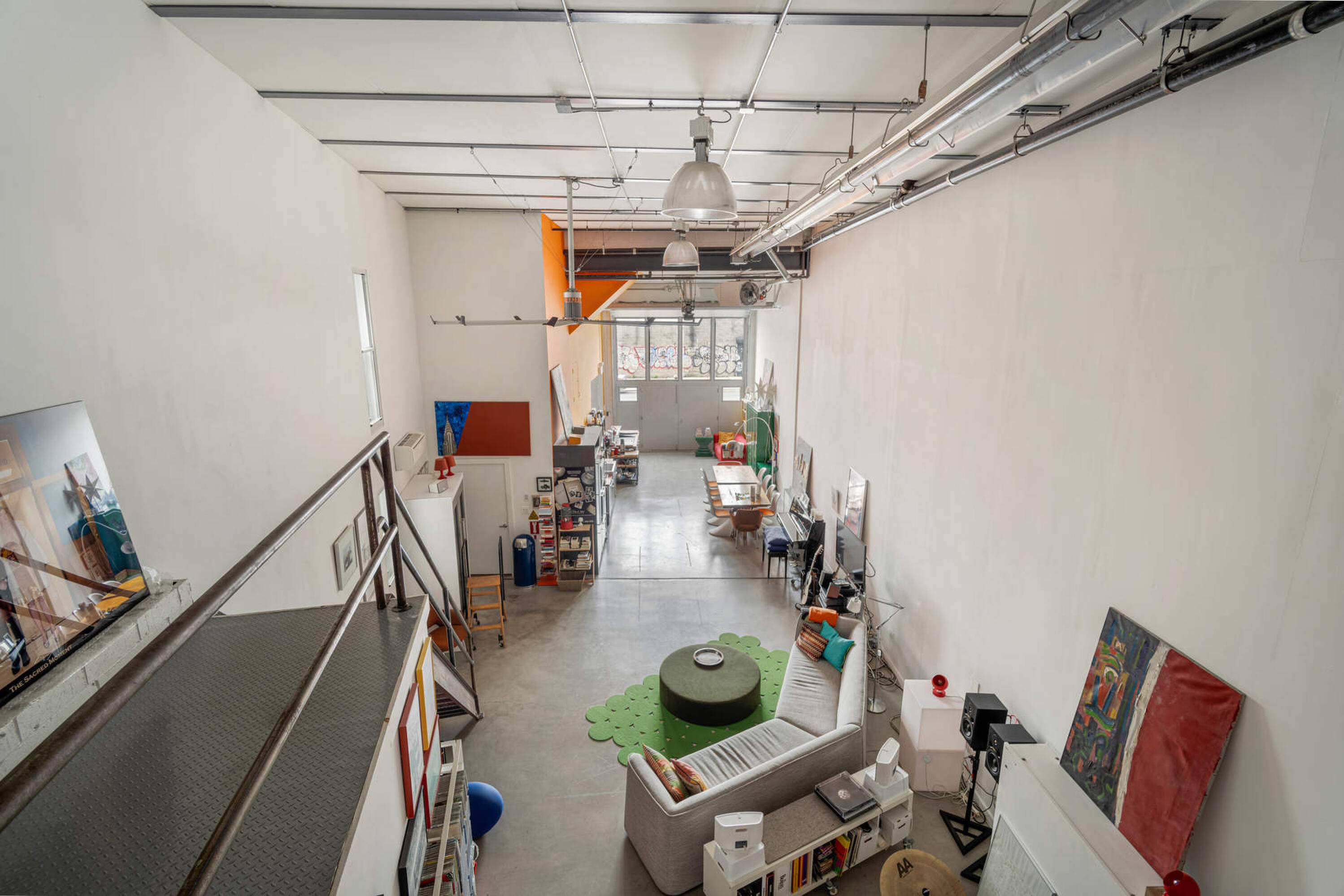 251 Montrose Avenue Brooklyn, NY 11206 - Photo 6 of 15 a view of entryway with workspace and livingroom view