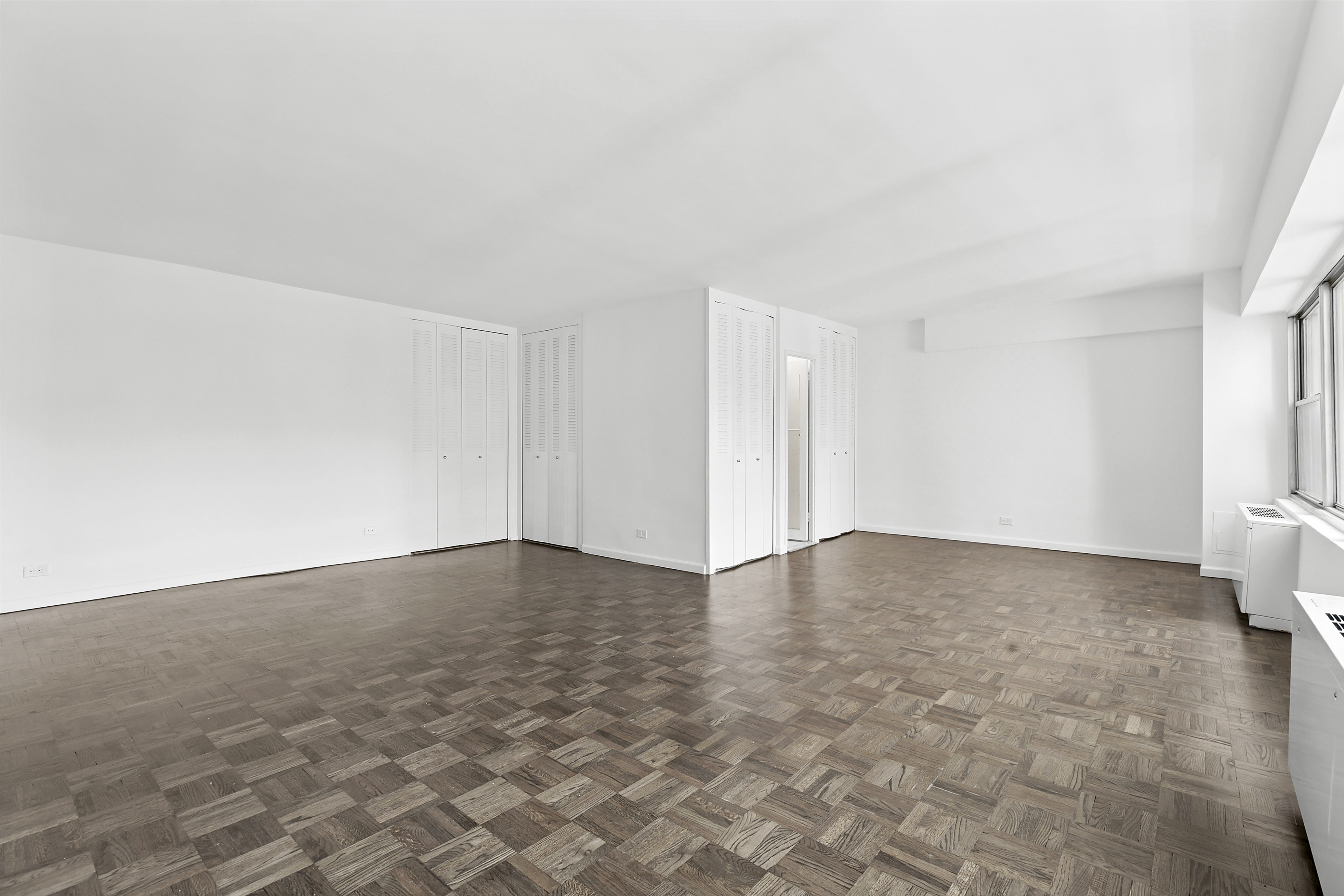 118 East 60th Street, Unit 32F Manhattan, NY 10022 - Photo 3 of 6 a view of empty room