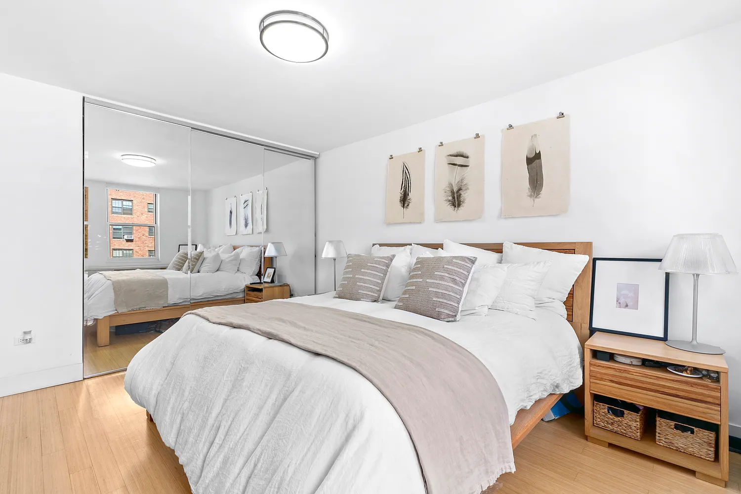 a bed room with a bed and a chair