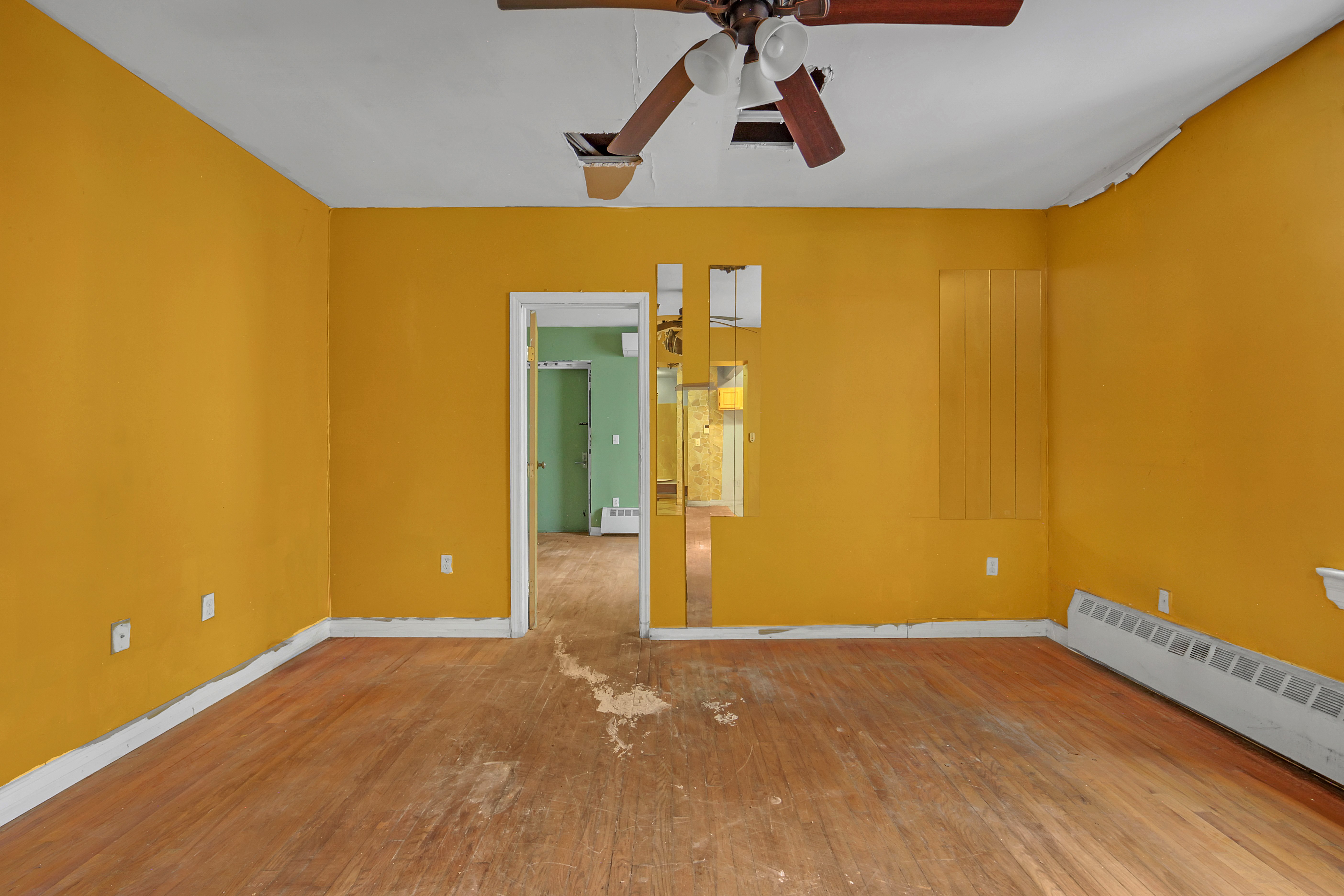 a view of an empty room with windows