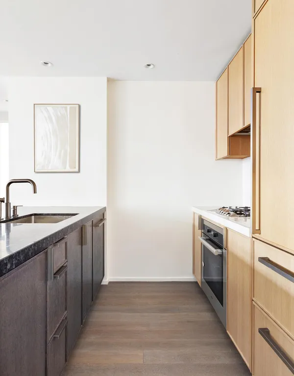 a kitchen with a sink and a stove