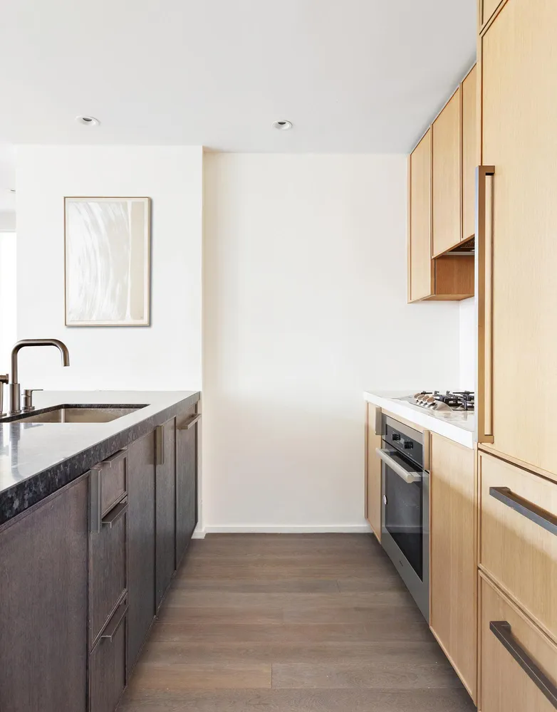a kitchen with a sink and a stove