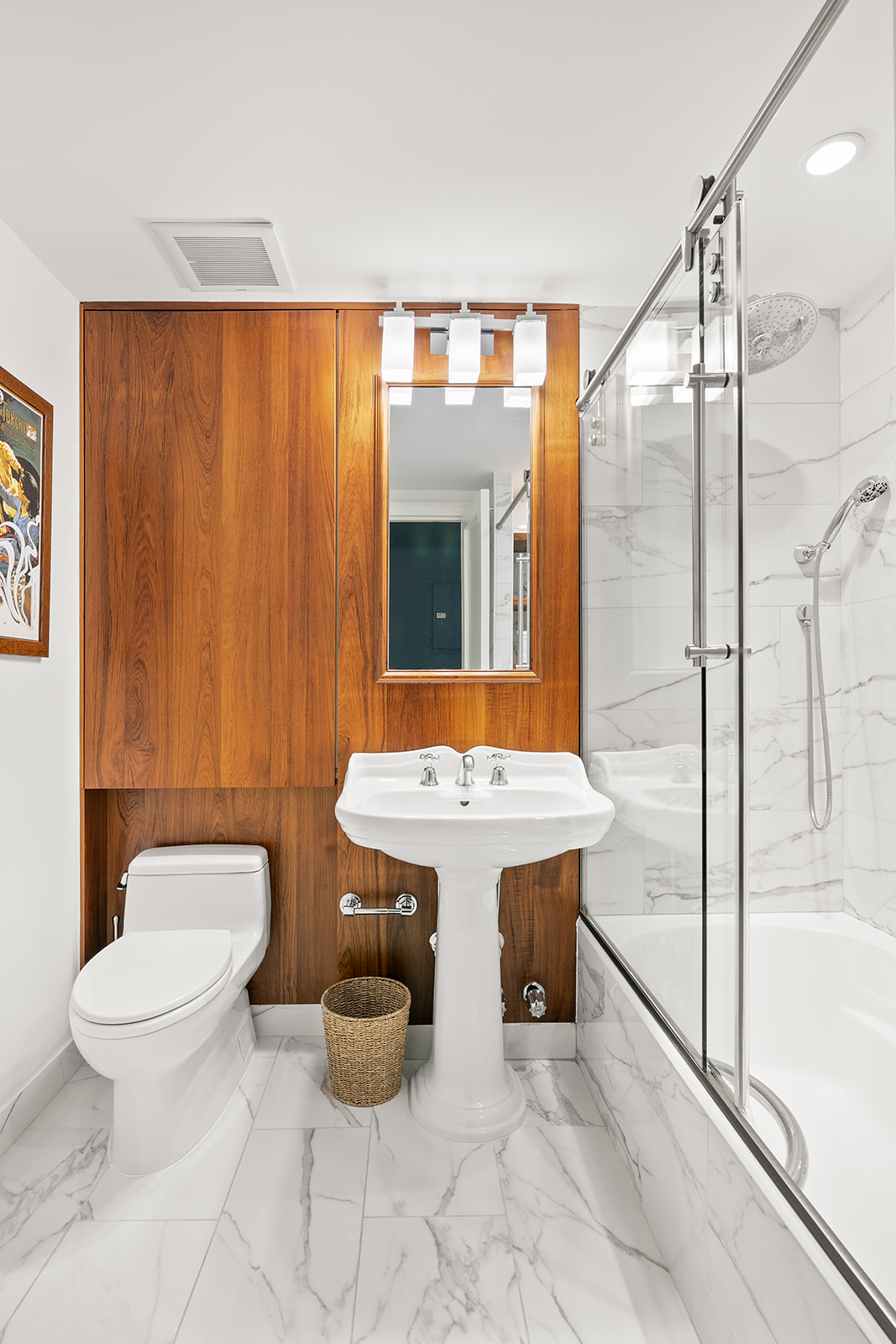 24 West 70th Street, Unit 1 Manhattan, NY 10023 - Photo 9 of 11 a bathroom with a sink toilet and shower