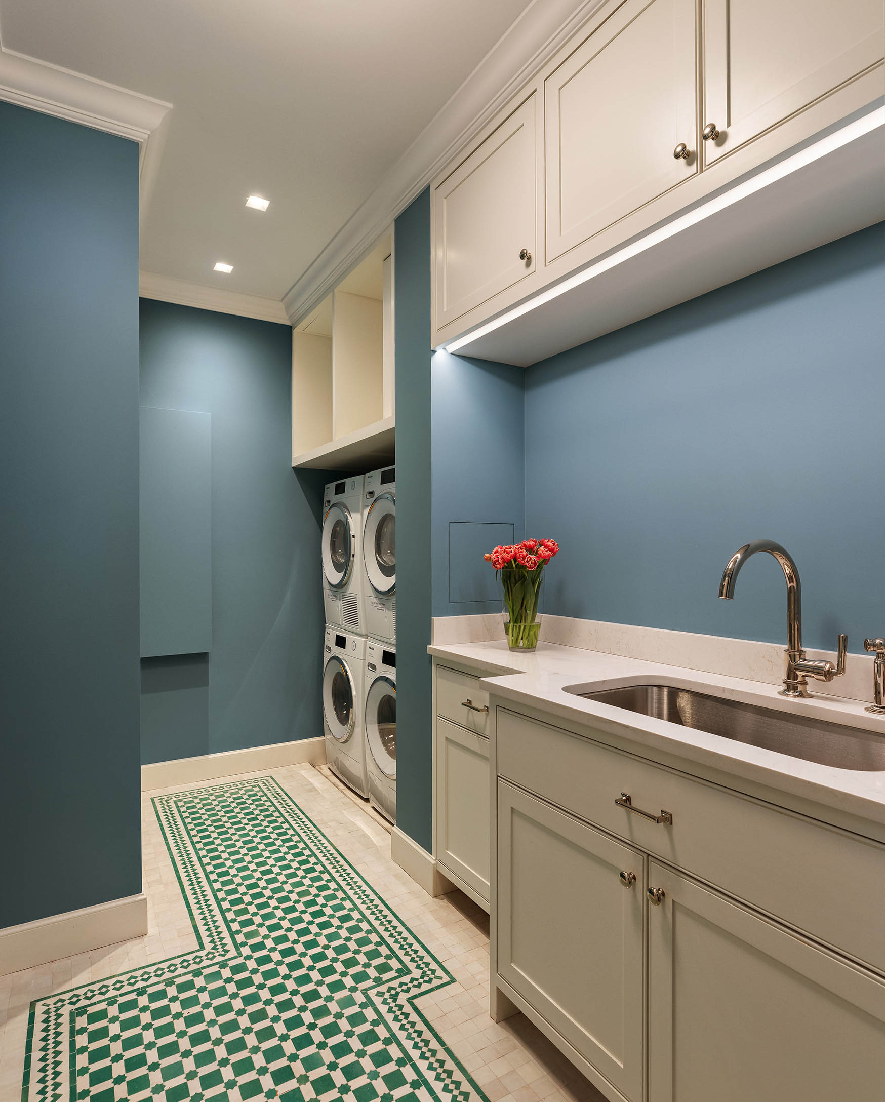 150 East 73rd Street, Unit PH Manhattan, NY 10021 - Photo 23 of 29 a kitchen with a sink and cabinets