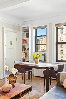 a room with furniture and window