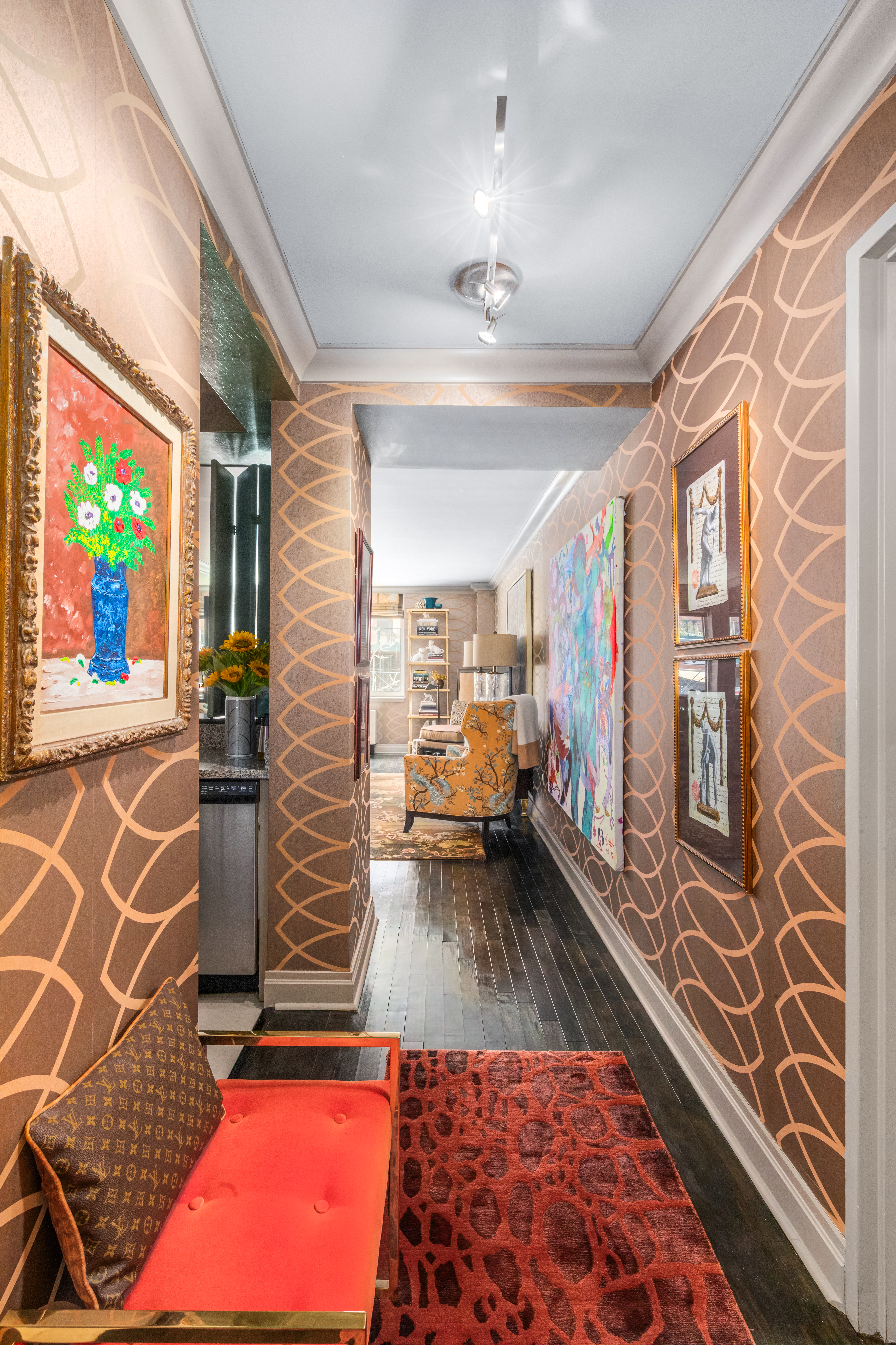 1760 2nd Avenue, Unit 2B Manhattan, NY 10128 - Photo 4 of 13 a hallway with a couch