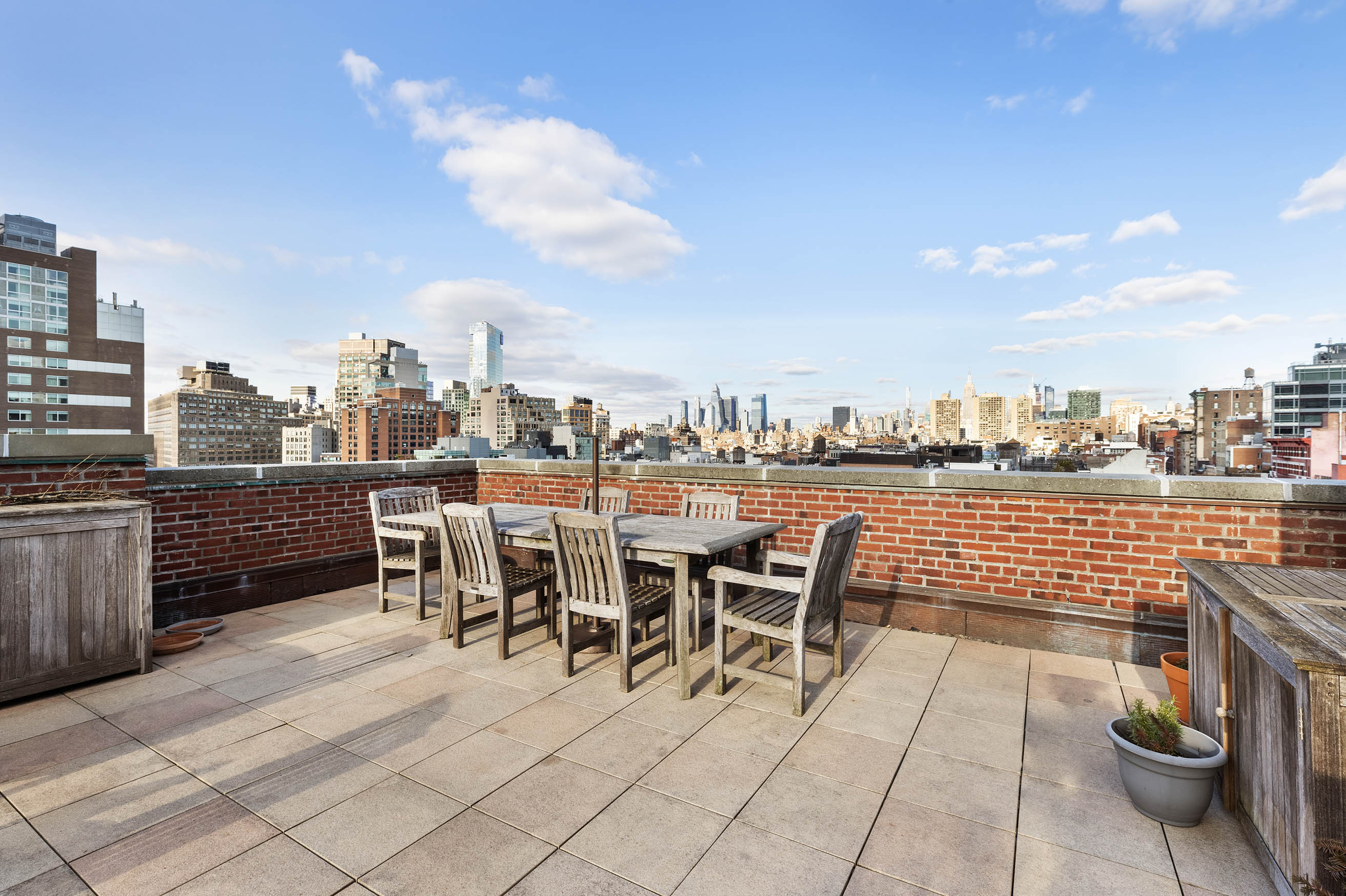 45 Lispenard Street, Unit 3E Manhattan, NY 10013 - Photo 7 of 9 a view of a terrace with furniture and stove