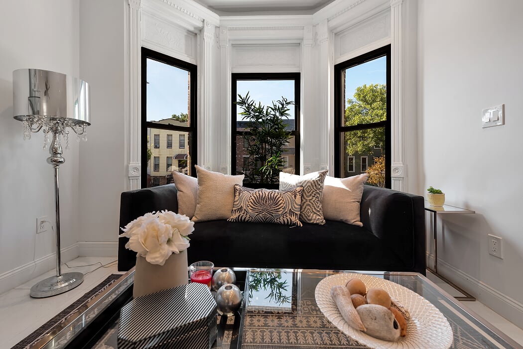 16 Pilling Street Brooklyn, NY 11207 - Photo 5 of 11 a living room with furniture and a large window