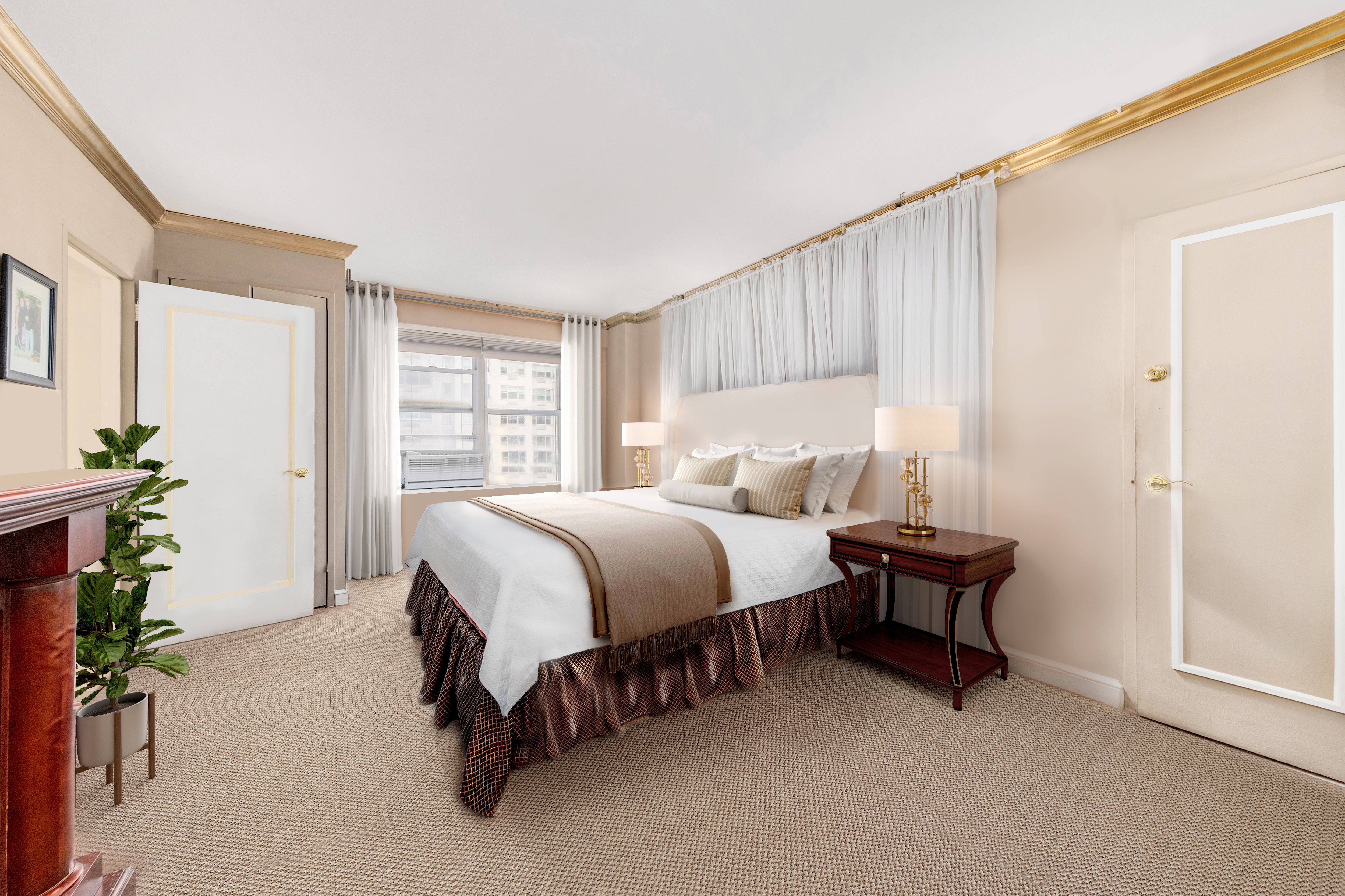 50 Sutton Place South, Unit 9F Manhattan, NY 10022 - Photo 7 of 10 a bedroom with a bed and a potted plant