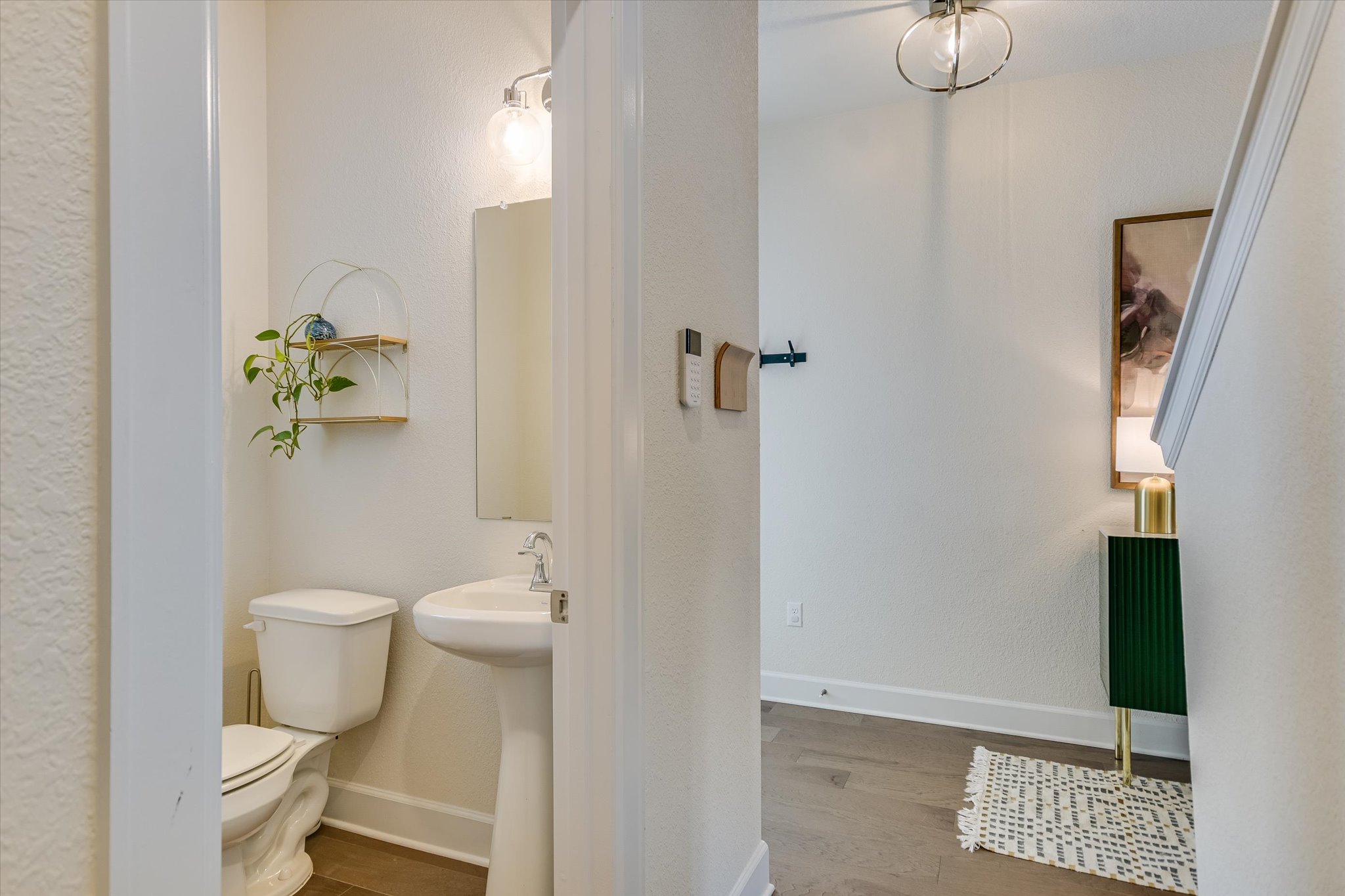 8607 McKamy Drive Austin, TX 78744 - Photo 21 of 28 a bathroom with a toilet and a shower