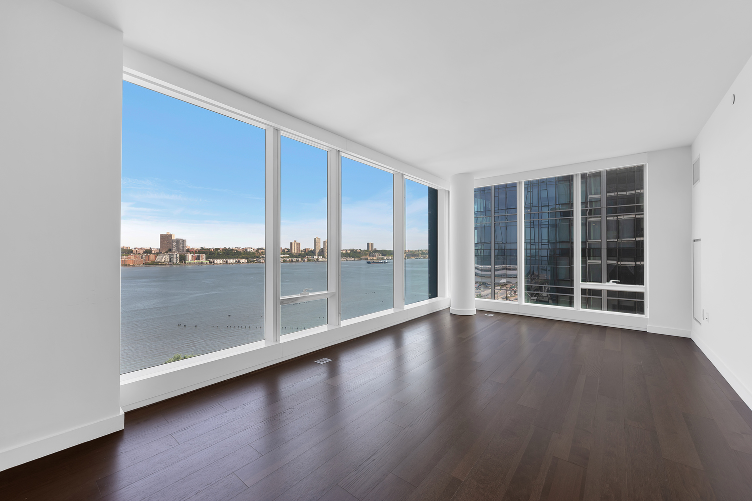 30 Riverside Boulevard, Unit 1414 Manhattan, NY 10069 - Photo 2 of 25 wooden floor in an empty room with a window