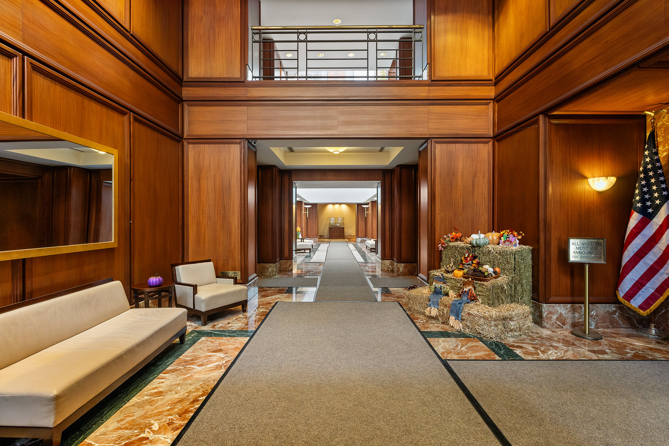 2 South End Avenue, Unit 7B Manhattan, NY 10280 - Photo 12 of 17 a lobby with furniture and lamp