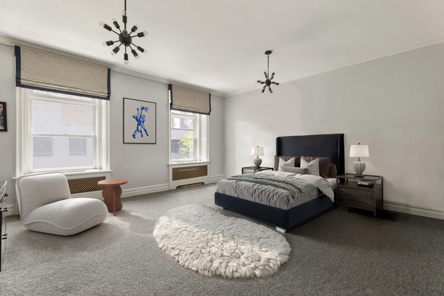 a spacious bedroom with a bed and window