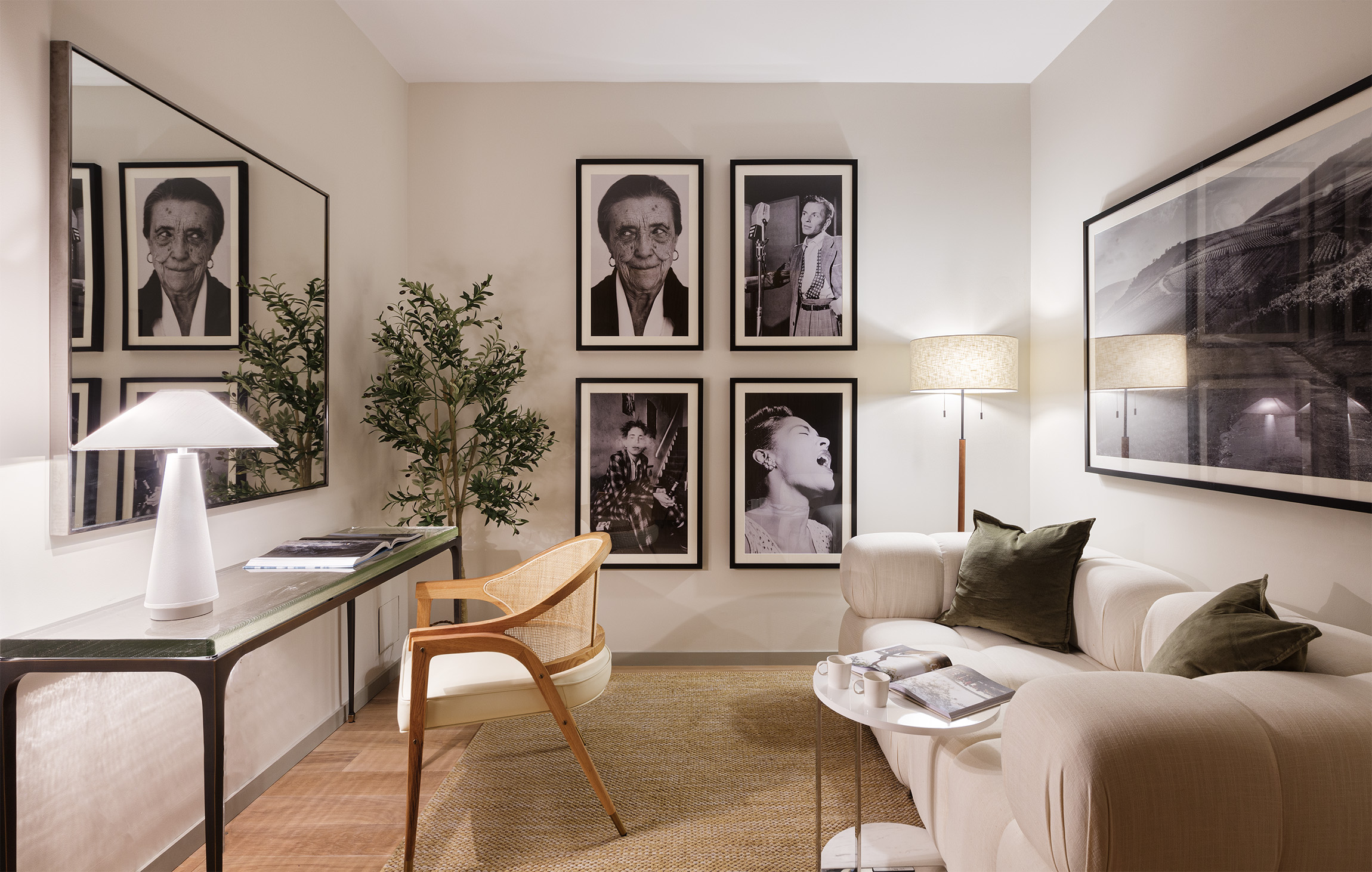 29 West 21st Street, Unit 5 Manhattan, NY 10010 - Photo 11 of 20 a living room with furniture and paintings on the wall