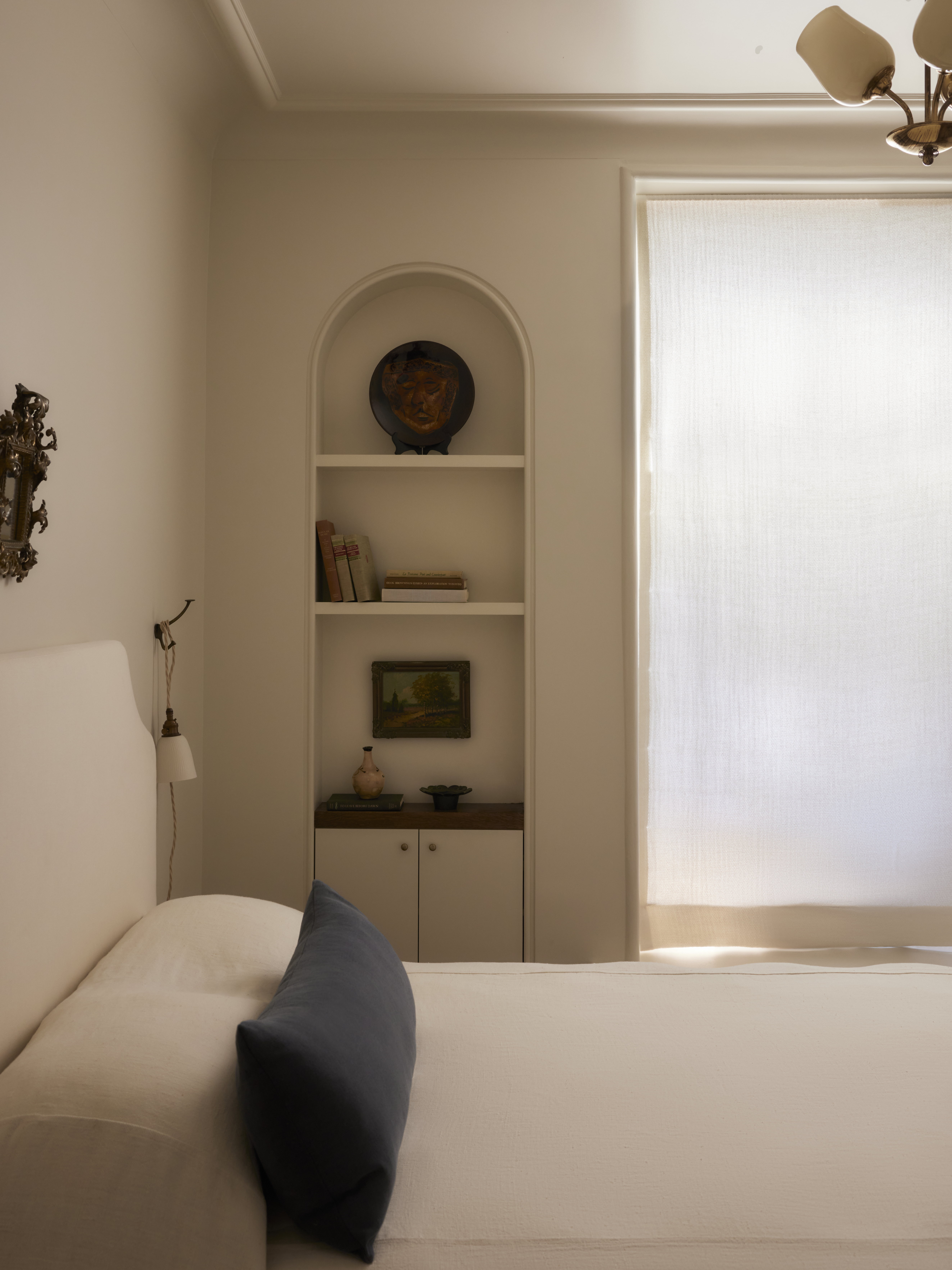 2109 Broadway, Unit 15/157 Manhattan, NY 10023 - Photo 11 of 19 a bedroom with a bed and a fireplace