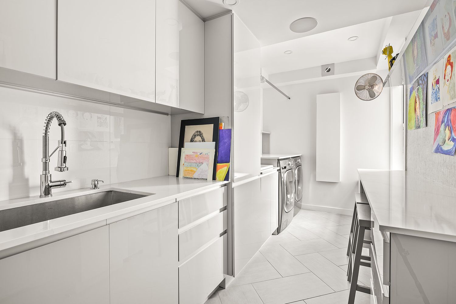 240 West End Avenue, Unit PH Manhattan, NY 10023 - Photo 22 of 25 a kitchen that has a sink and a stove in it