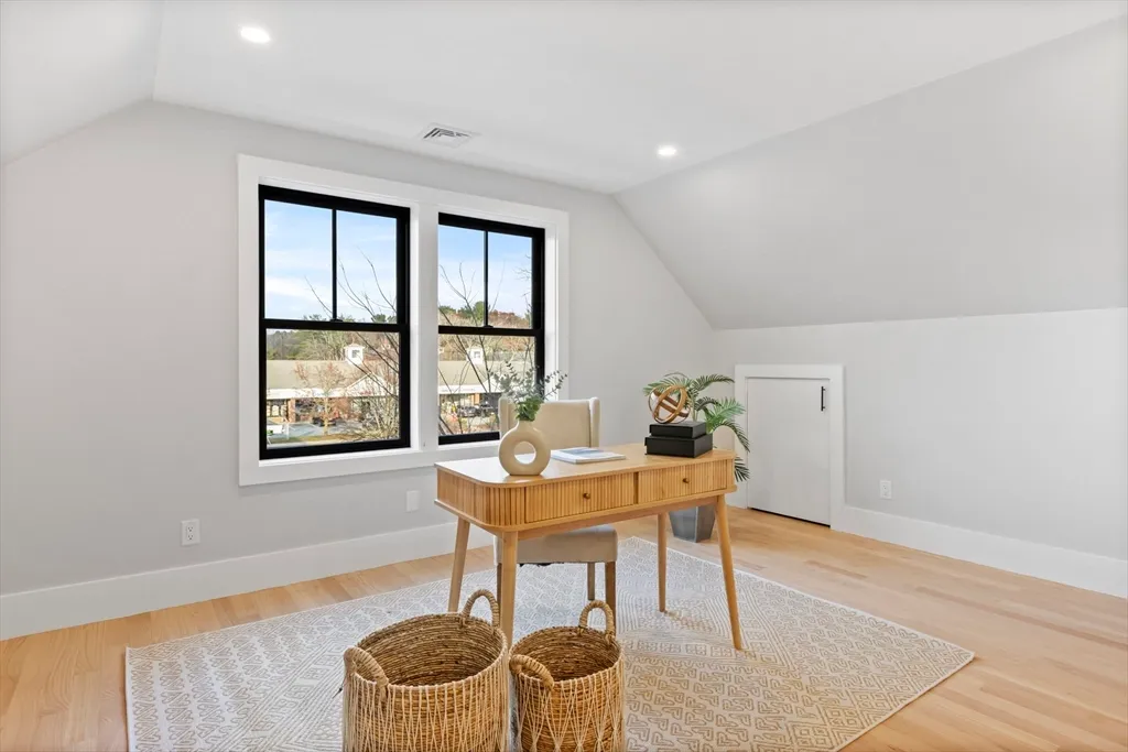 a workspace with furniture and window