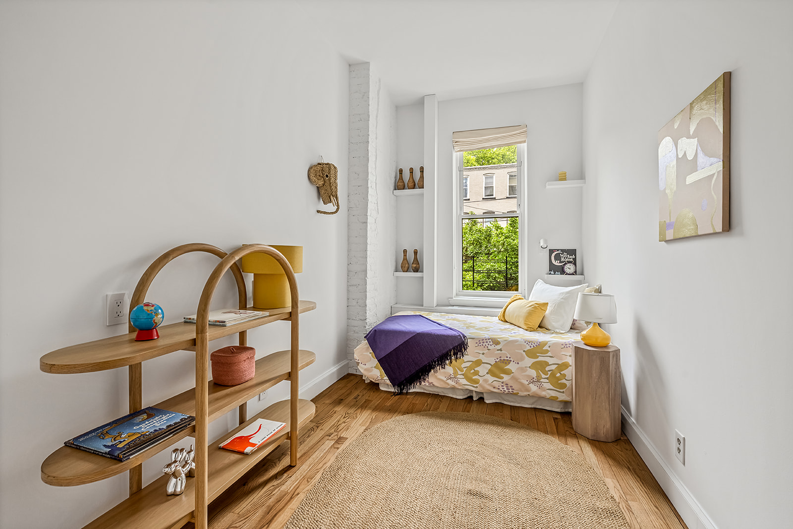 482 12th Street, Unit 1 Brooklyn, NY 11215 - Photo 5 of 10 a bedroom with a bed and a window