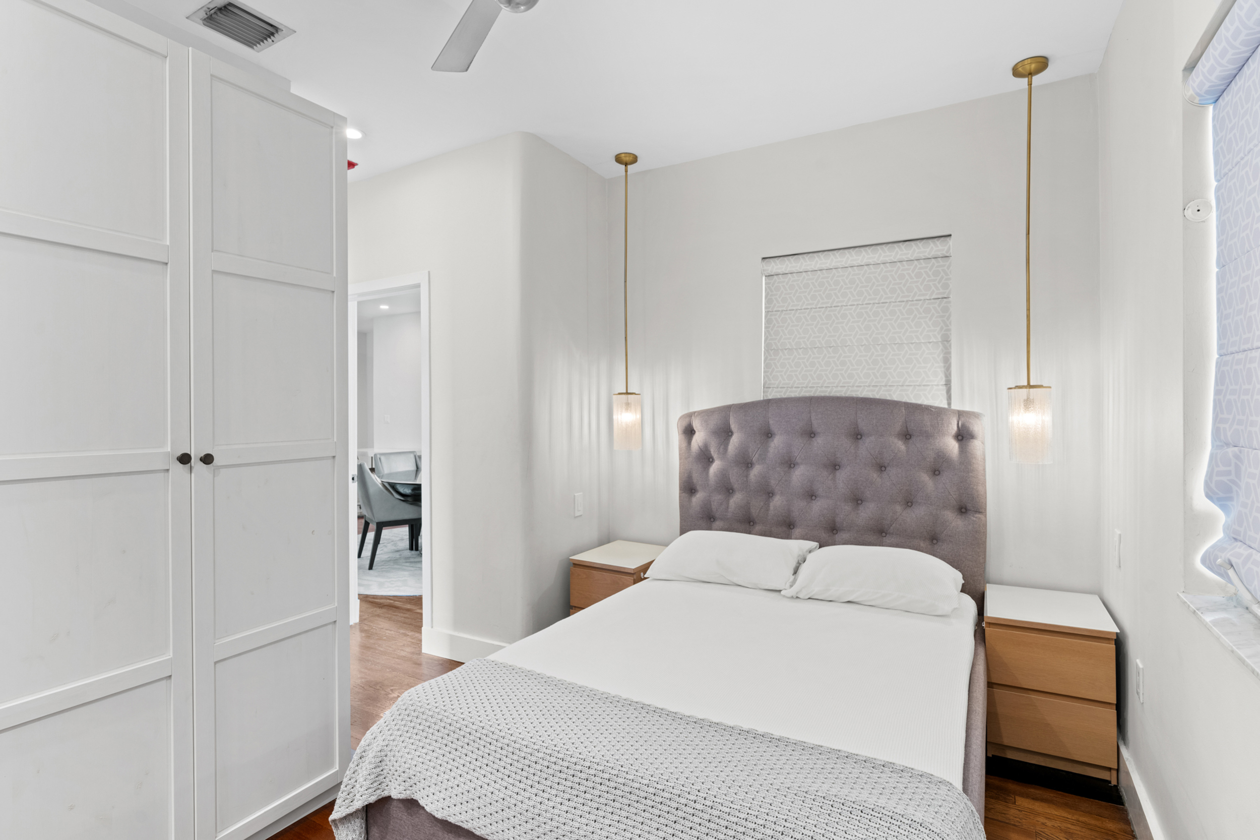 711 East 14th Street, Unit 7 Hialeah, FL 33010 - Photo 19 of 36 a bedroom with a bed and a closet