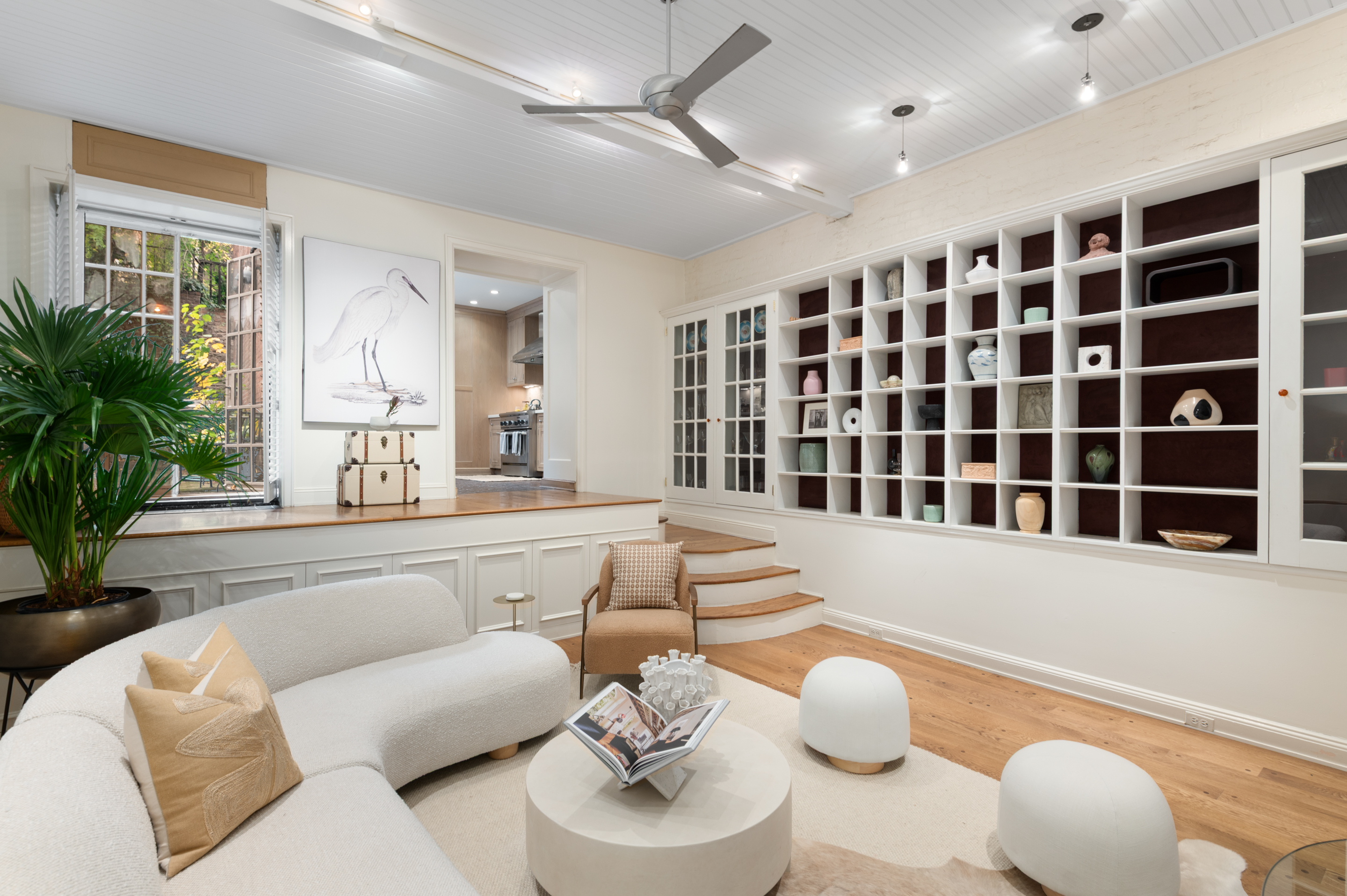 126 West 78th Street Manhattan, NY 10024 - Photo 12 of 39 a living room with furniture potted plant and a large window