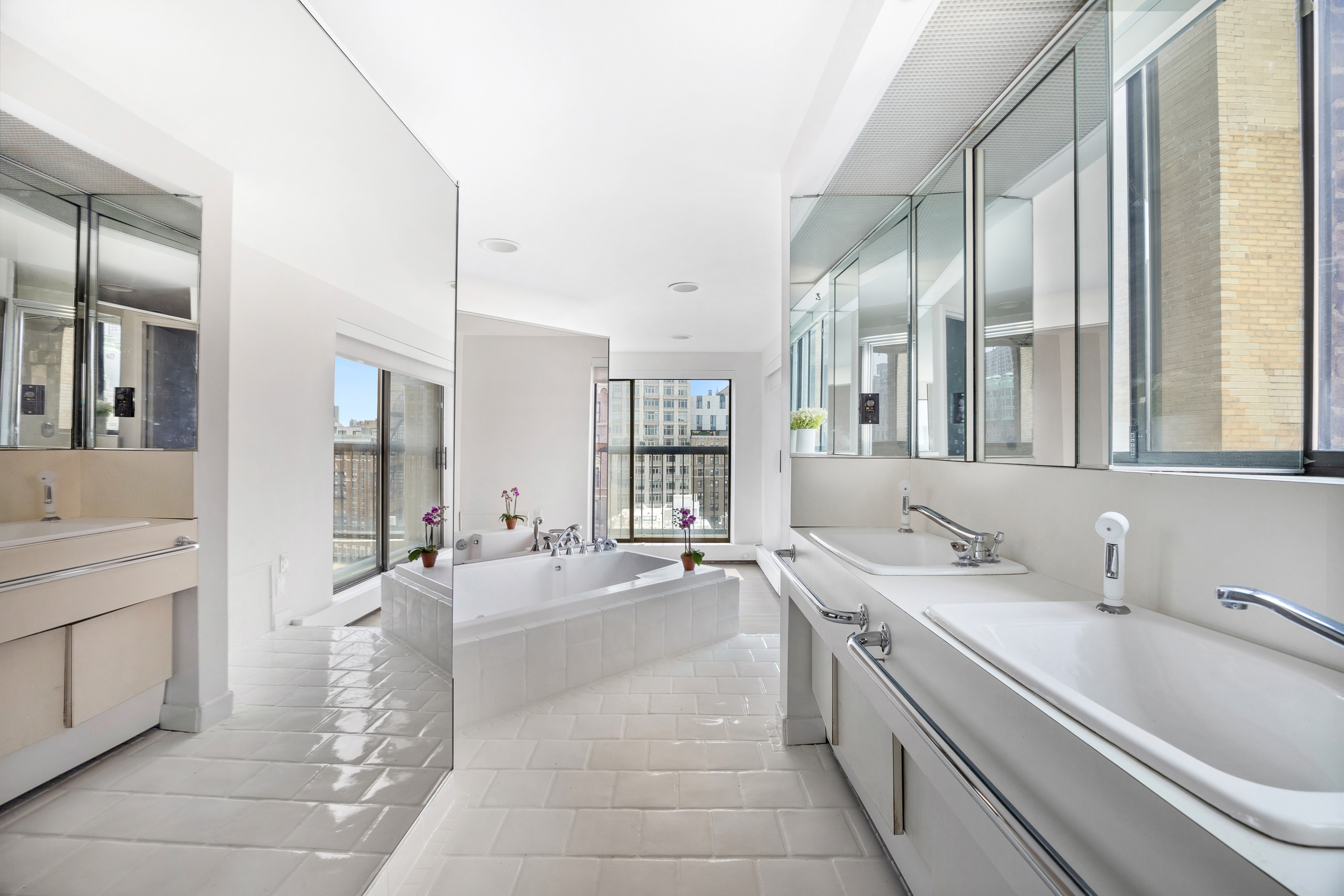 330 West End Avenue, Unit PHB Manhattan, NY 10023 - Photo 11 of 20 a large white kitchen with a large window